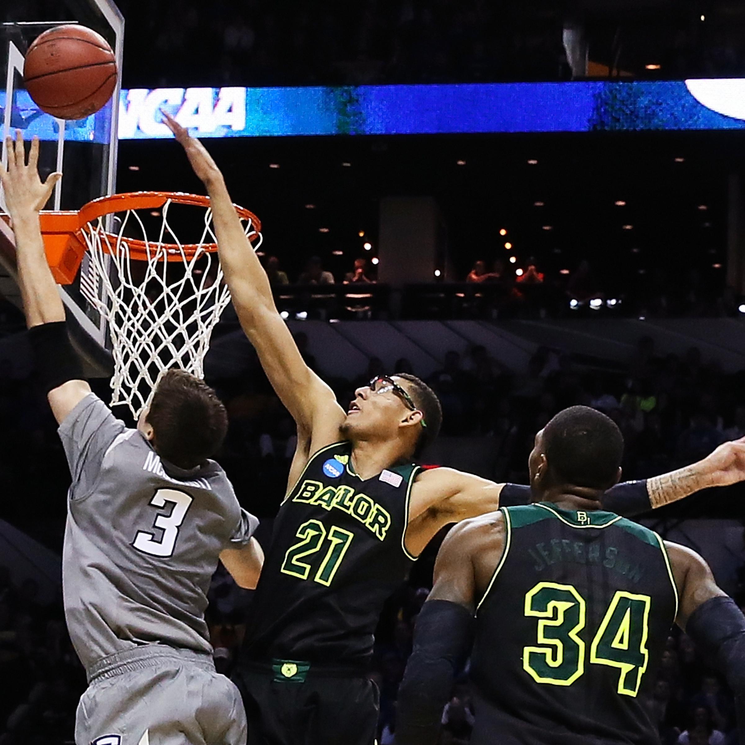Baylor Bears center Isaiah Austin blocks Creighton Bluejays forward Doug McDermott in the second half of a men's college basketball game during the third round of the 2014 NCAA Tournament at AT&T Center on March 23, 2014 in San Antonio.