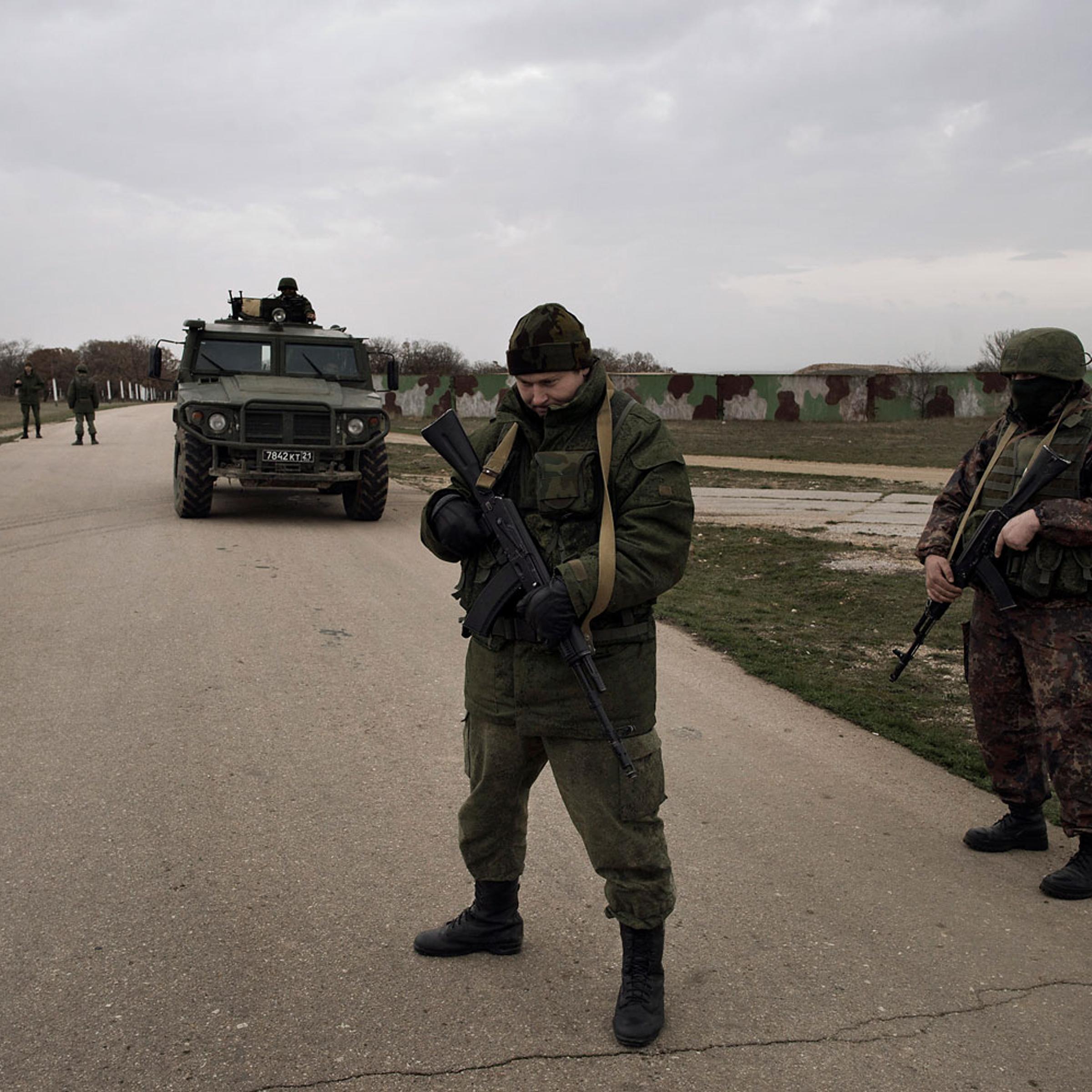 Belbek Ukraine March 04 2014Russian soldiers control Belbek airfield in CrimeaIn a graphic illustration of the standoff and its potential hazards, Russian troops on Tuesday fired warning shots in the air as approximately 200 unarmed Ukrainian soldiers ap