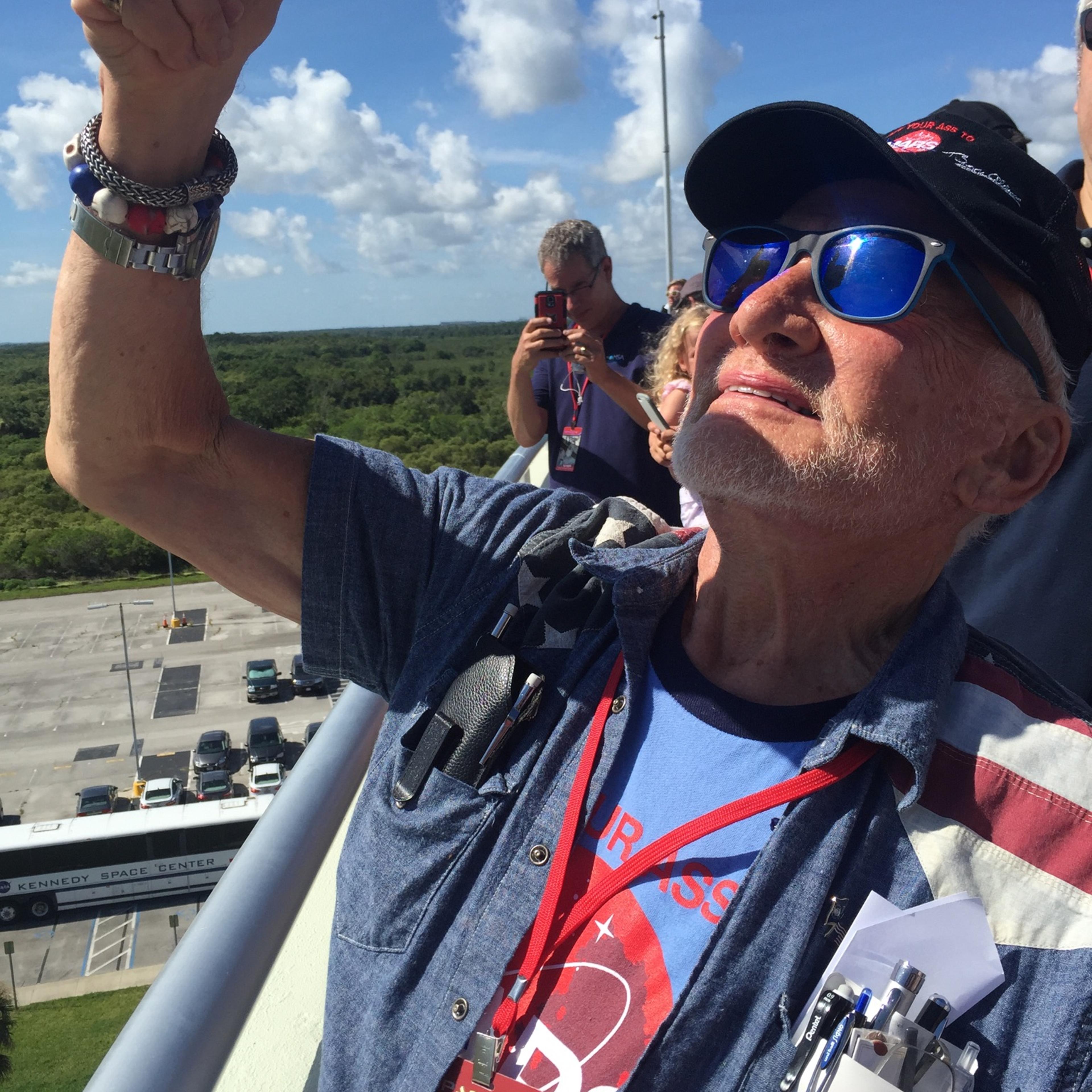 Dr. Buzz Aldrin watches the Spacex Falcon 9 rocket launch on June 28, 2015 at the Kennedy Space Center in Florida.