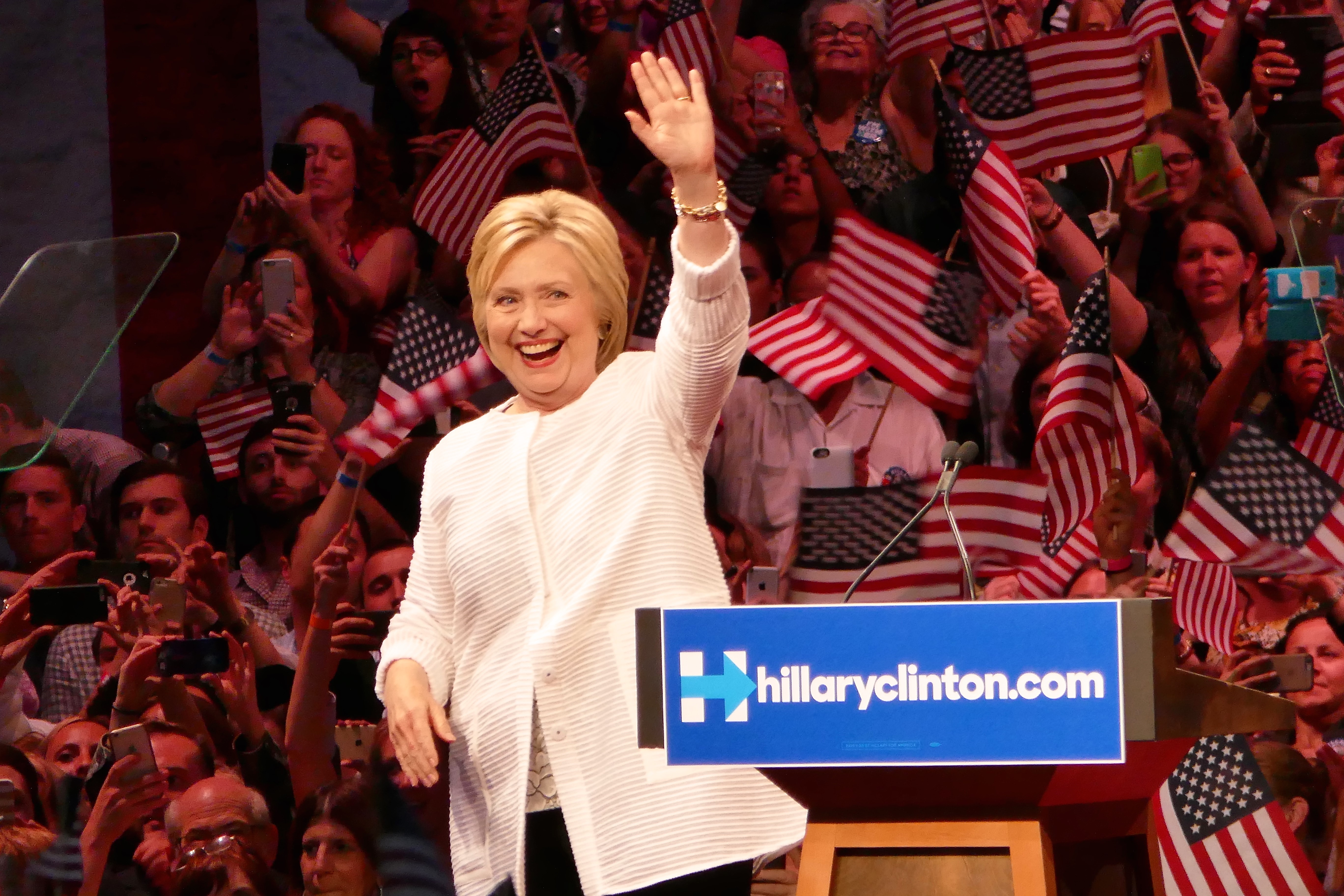 Clinton claims nomination as primaries near end