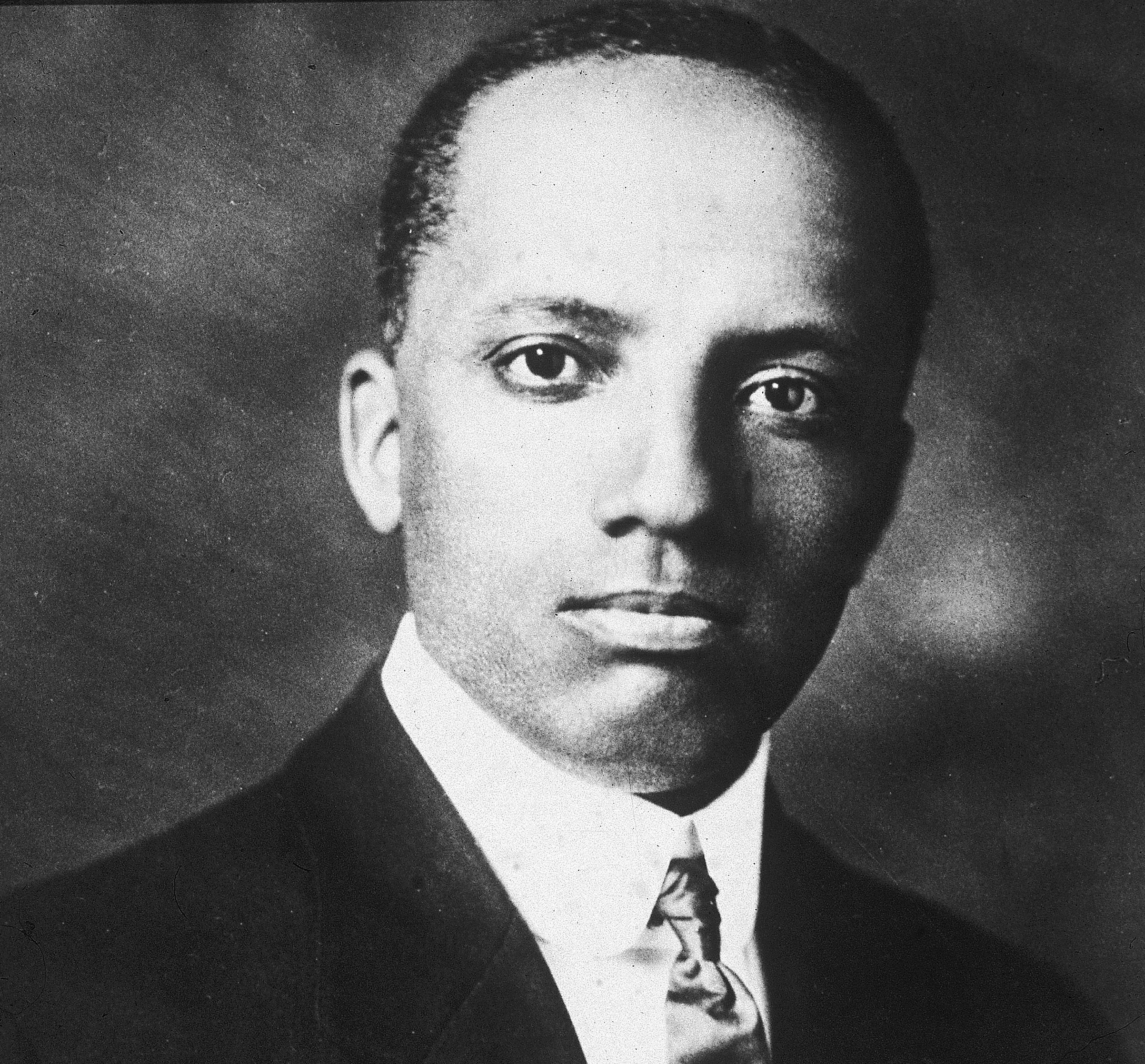 Portrait of Carter G. Woodson, historian known as the 'father of Black History,' circa 1910s.