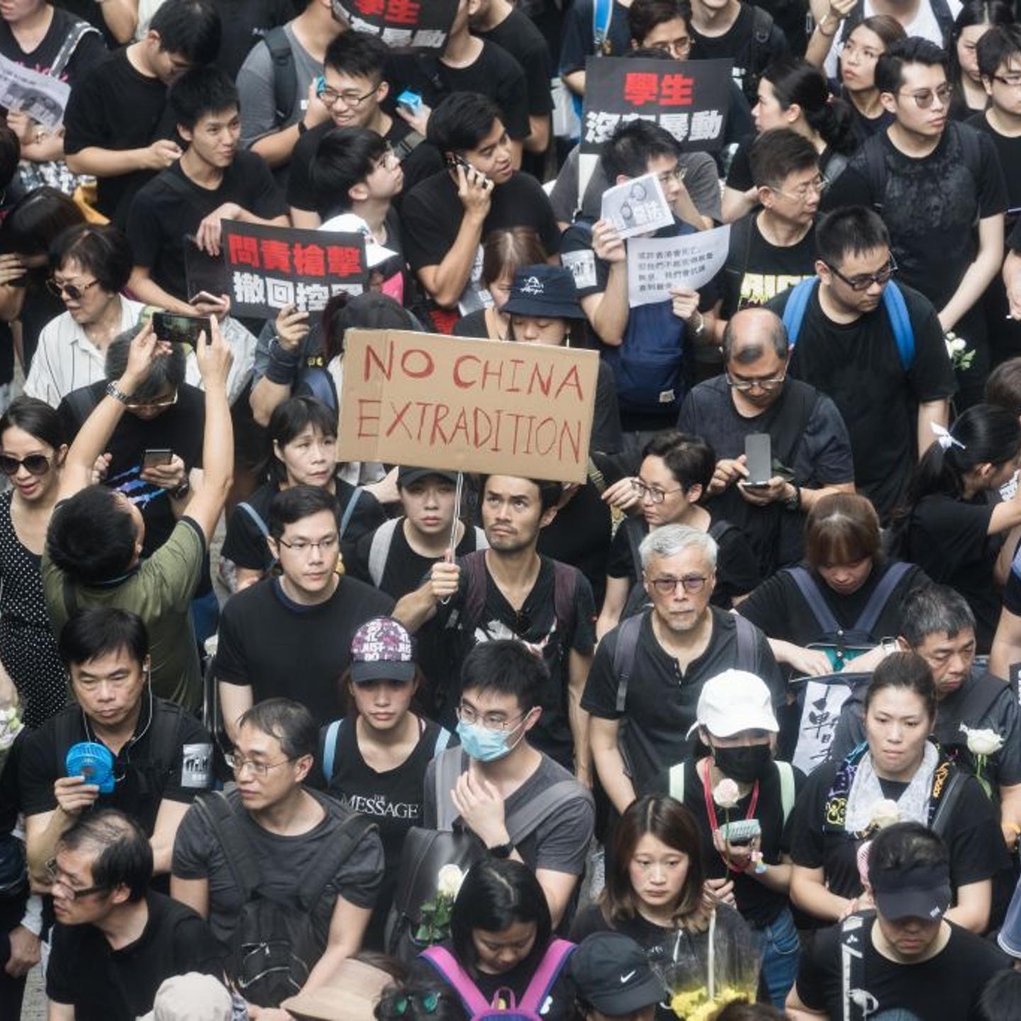 Protesters marched through the streets of Hong Kong holding