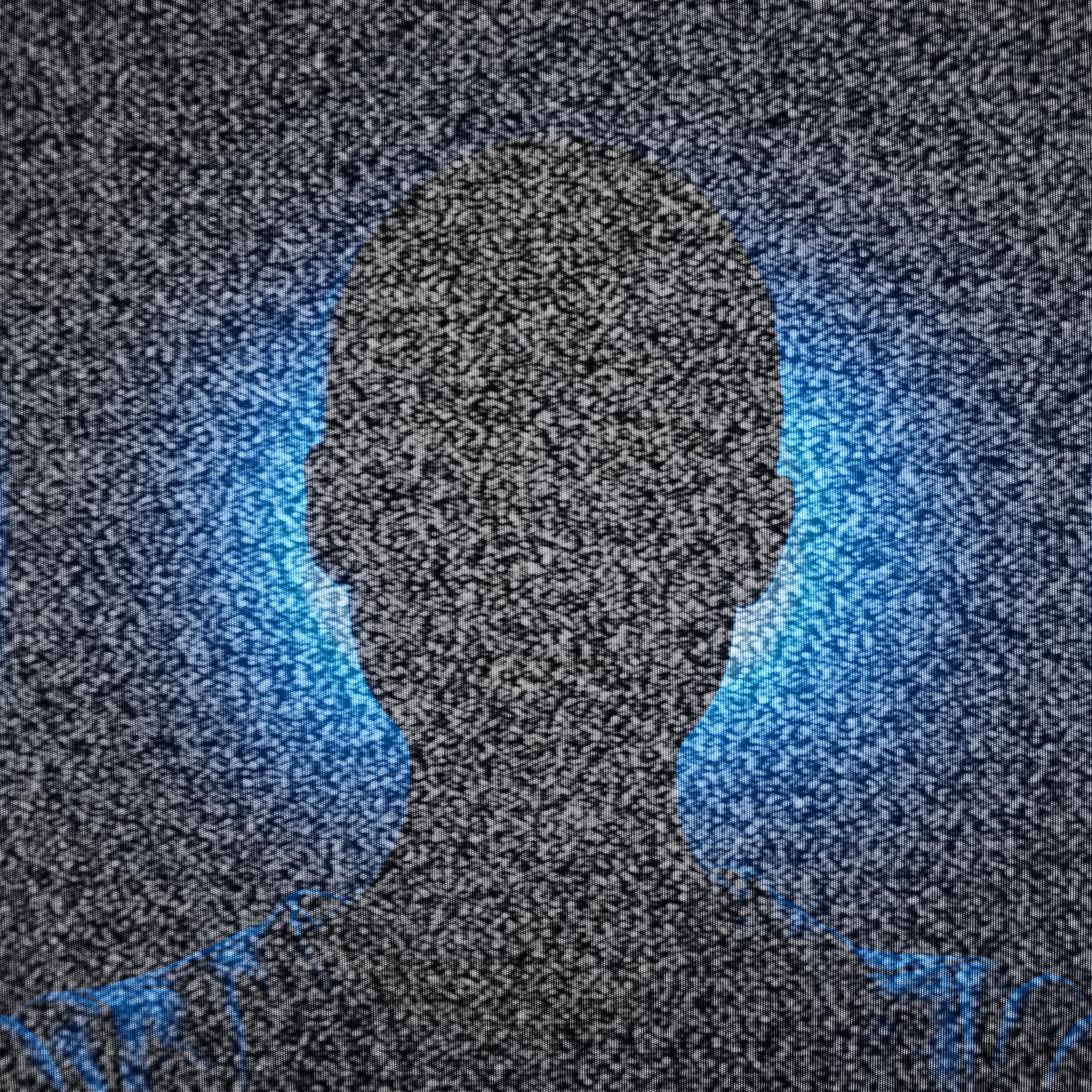 silhouette of woman in the dark with blue light behind