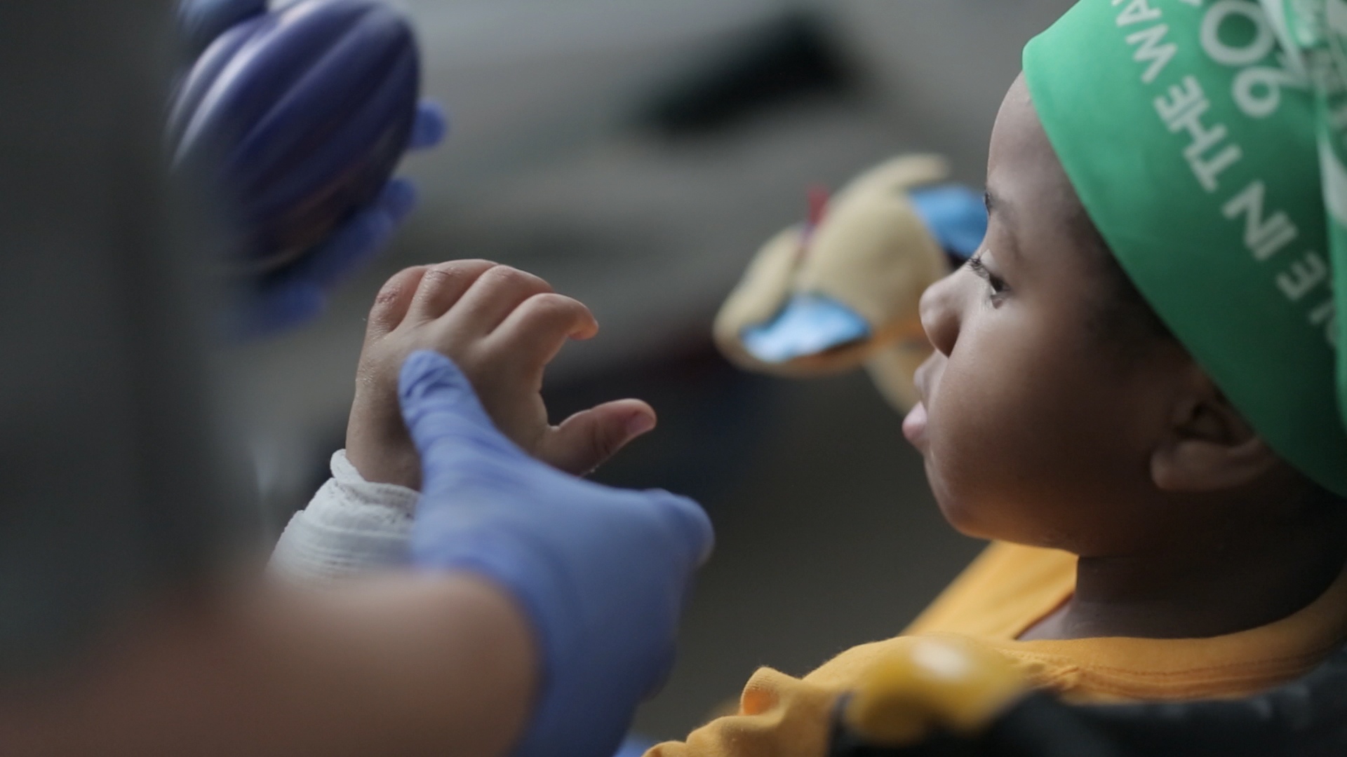 Zion with his new hands after the world's first bilateral hand transplant on a child at The Children's Hospital of Philidelphia.