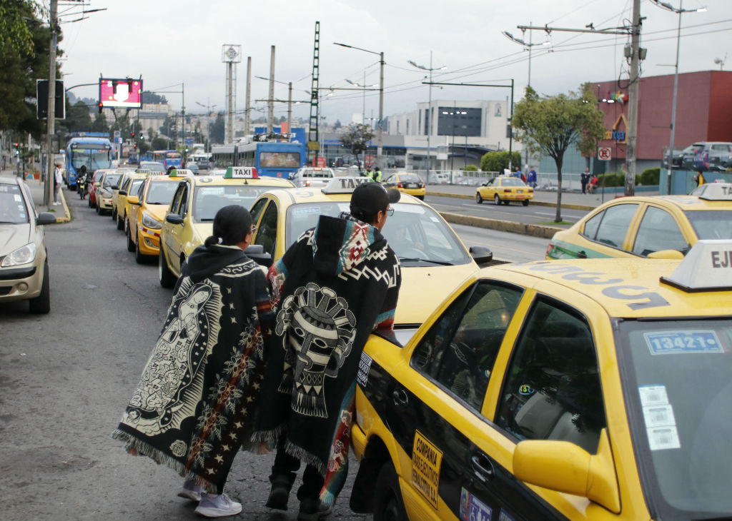 People look for alternative transport as Quito metro stopped after a blackout in Quito June 19, 2024.