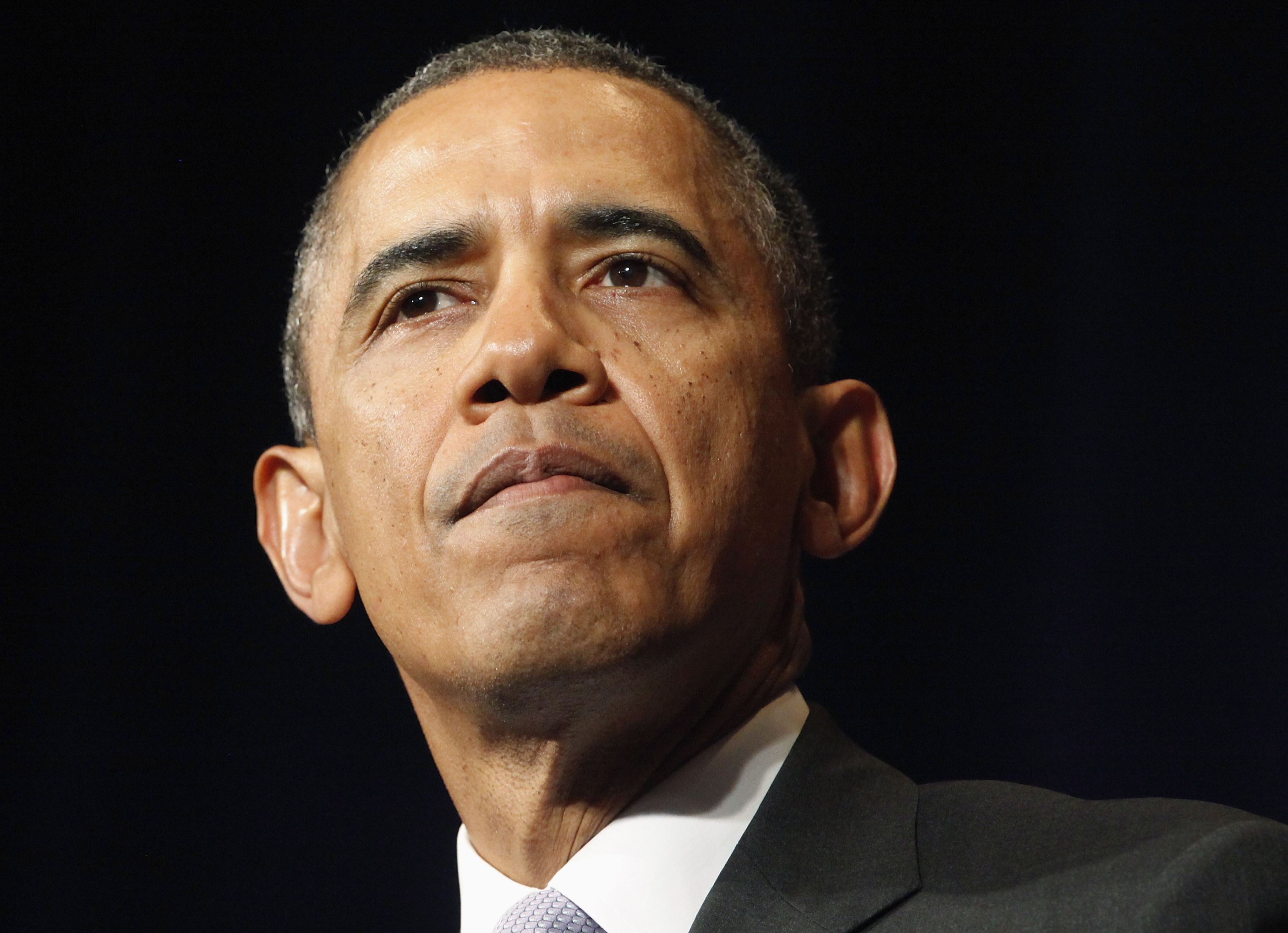 U.S. President Barack Obama addresses the winter meeting of the Democratic National Committee in Washington
