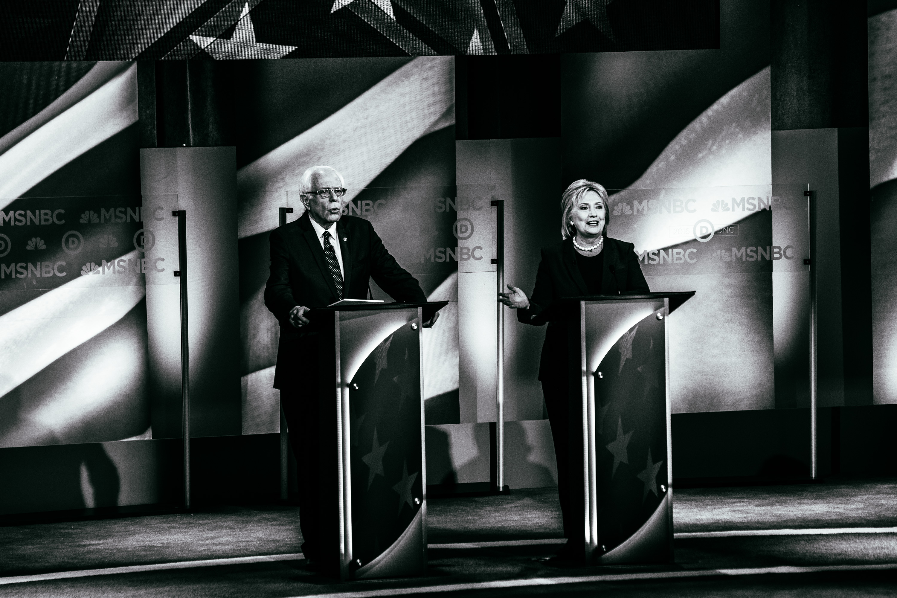 Democratic presidential candidates former Secretary of State Hillary Clinton and U.S. Sen. Bernie Sanders (I-VT) appear at a Democratic debate at the University of New Hampshire on Feb. 4, 2016 in Durham, N.H.