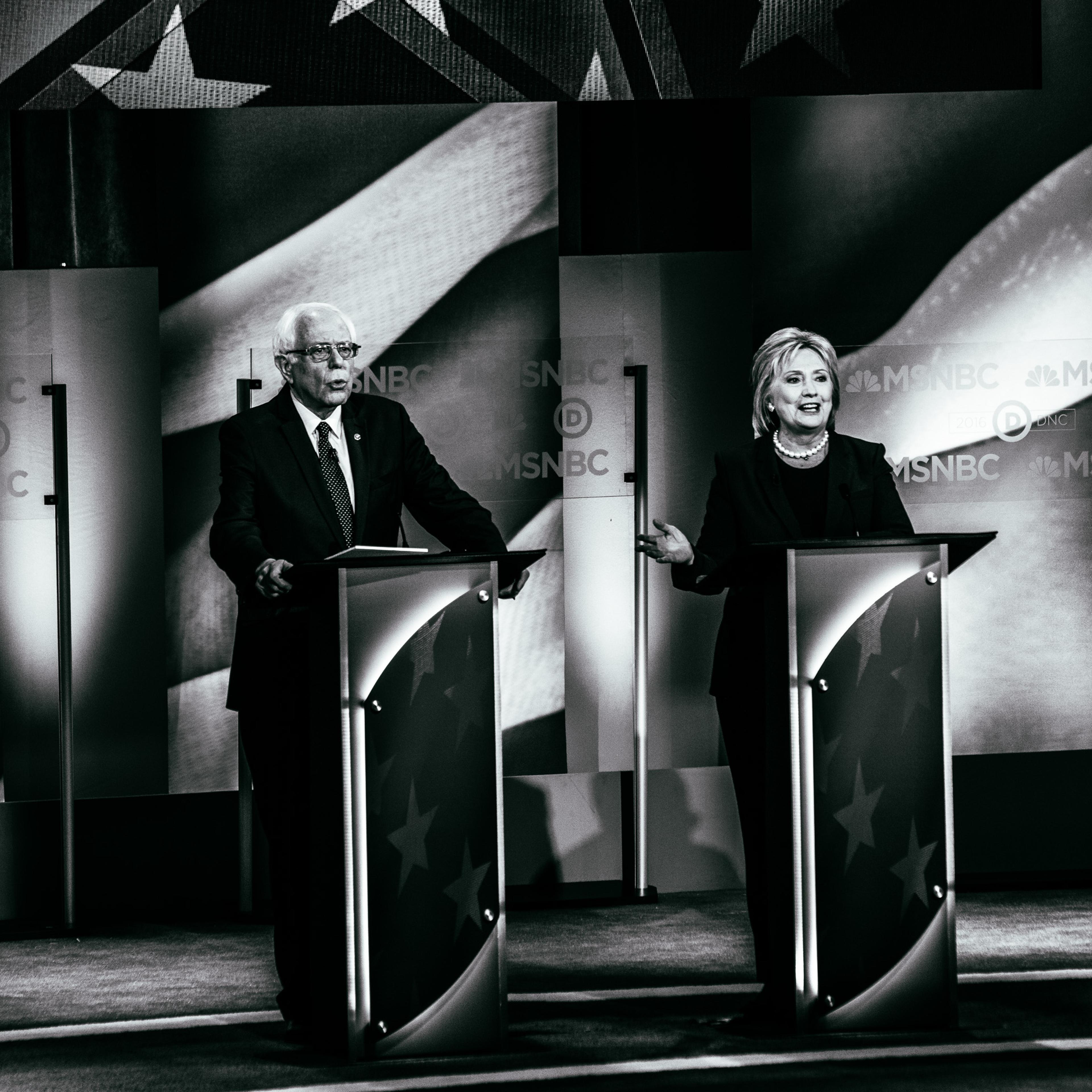 Democratic presidential candidates former Secretary of State Hillary Clinton and U.S. Sen. Bernie Sanders (I-VT) appear at a Democratic debate at the University of New Hampshire on Feb. 4, 2016 in Durham, N.H.
