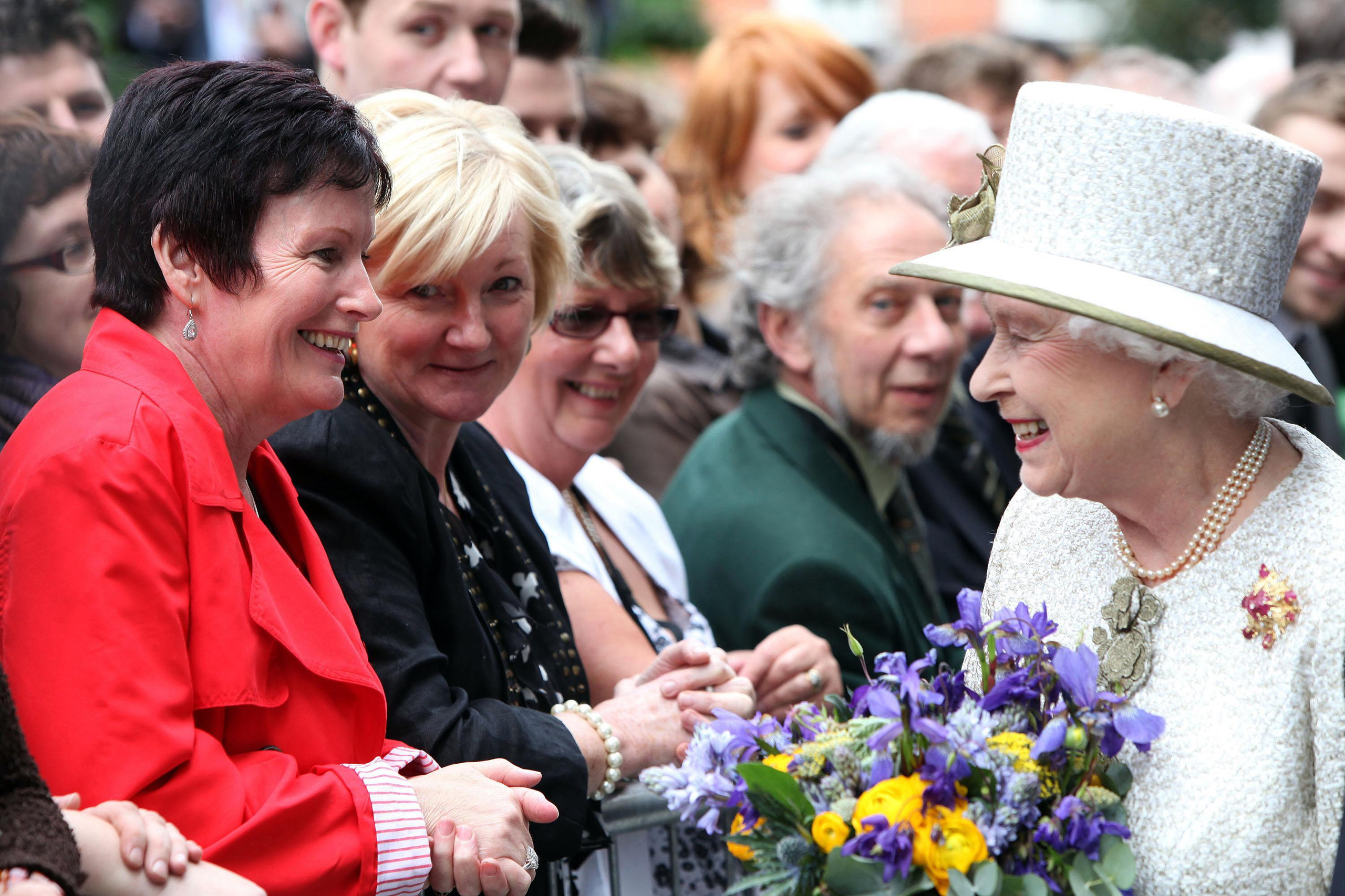 Queen Elizabeth II as she is greeted by a large group of well-wishers, as she leaves Trinity College in Dublin during the first day of her State Visit to Ireland on Dec. 27, 2011.