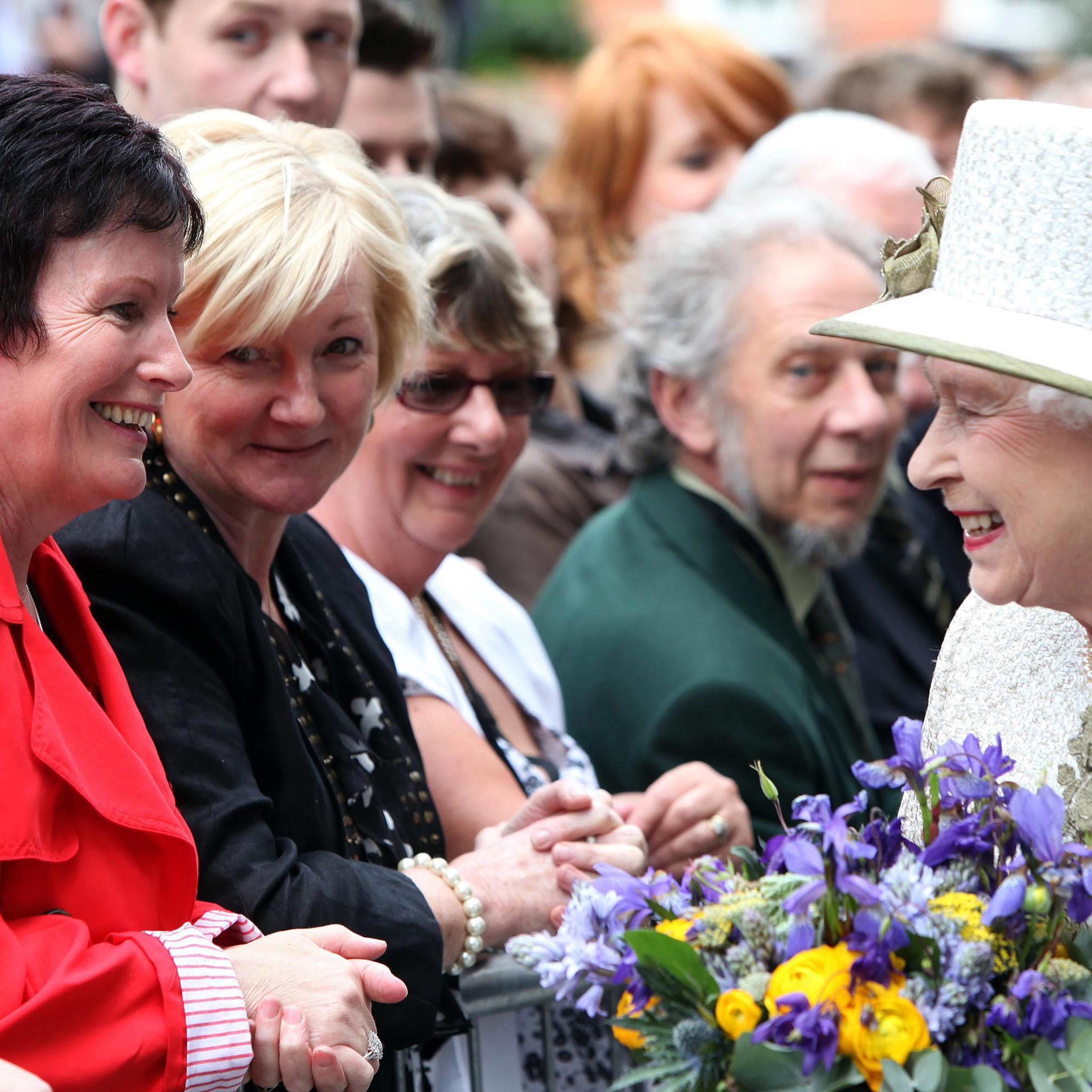 Queen Elizabeth II as she is greeted by a large group of well-wishers, as she leaves Trinity College in Dublin during the first day of her State Visit to Ireland on Dec. 27, 2011.