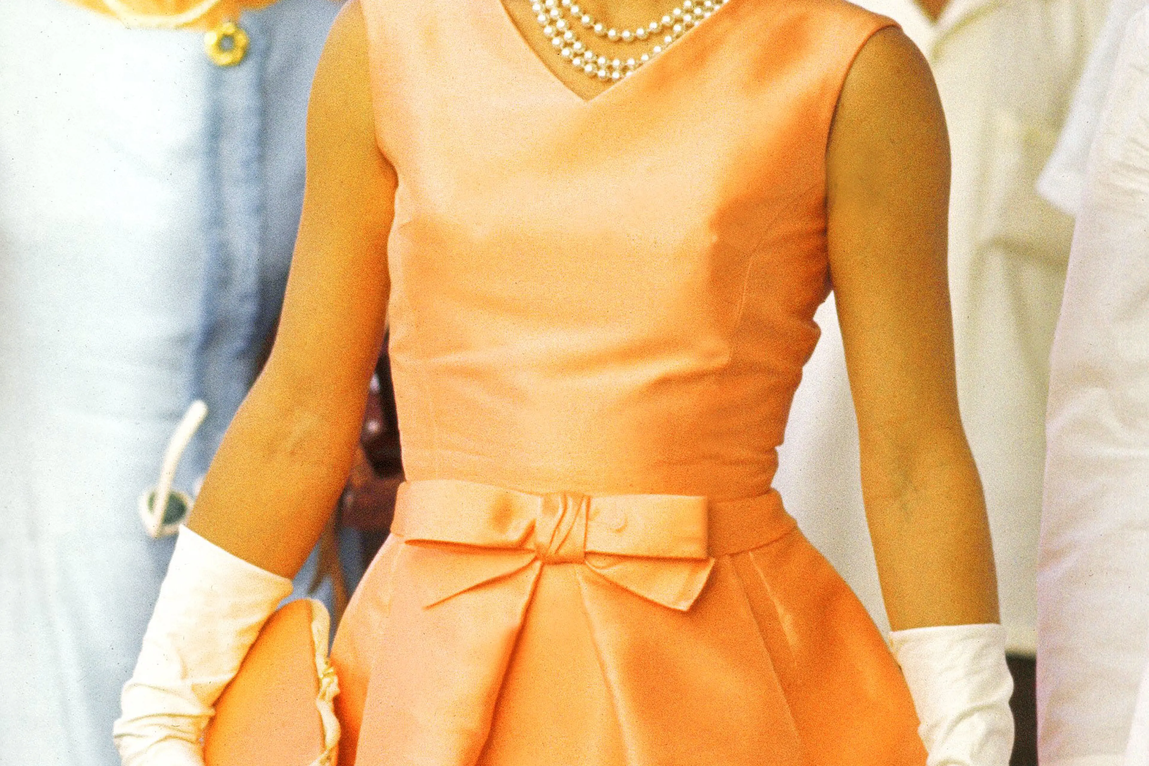 first lady gold dress Melania Trump turned heads as she attended a state banquet at Windsor Castle in a yellow, off-the-shoulder gown on Wednesday evening. But as images surfaced of the First Lady standing next to