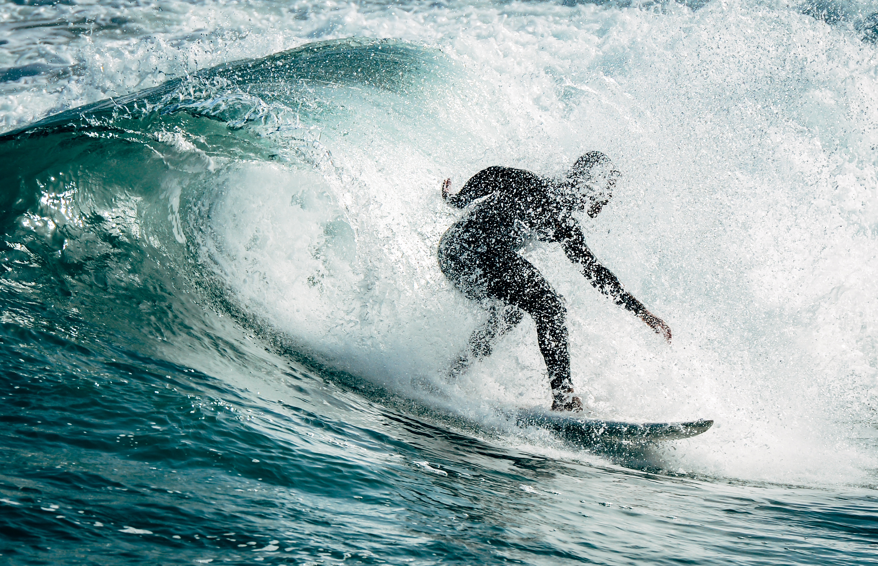 Man Surfing In Sea