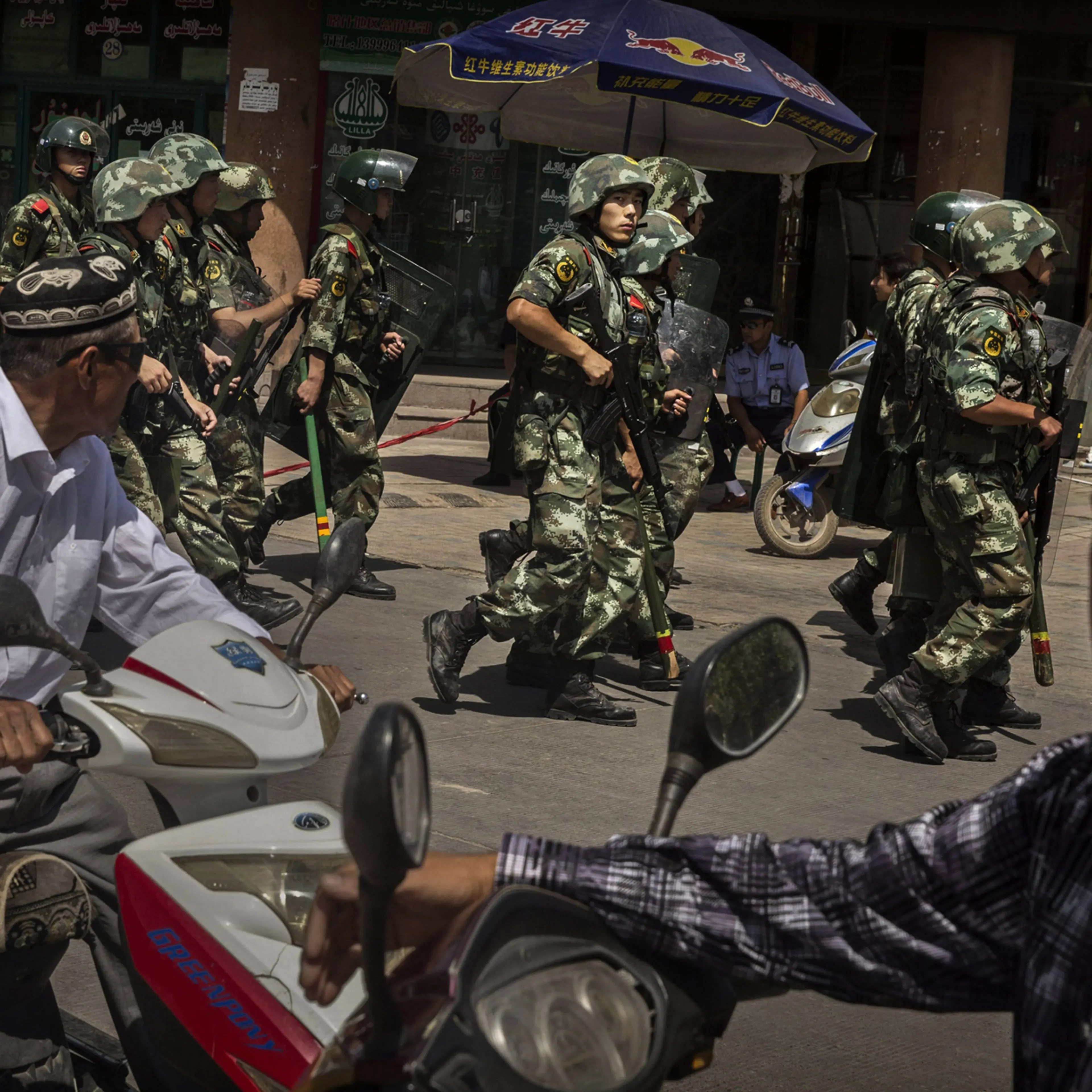 Chinese soldiers patrolling in old Kashgar, Xinjiang Province, July 30, 2014.
