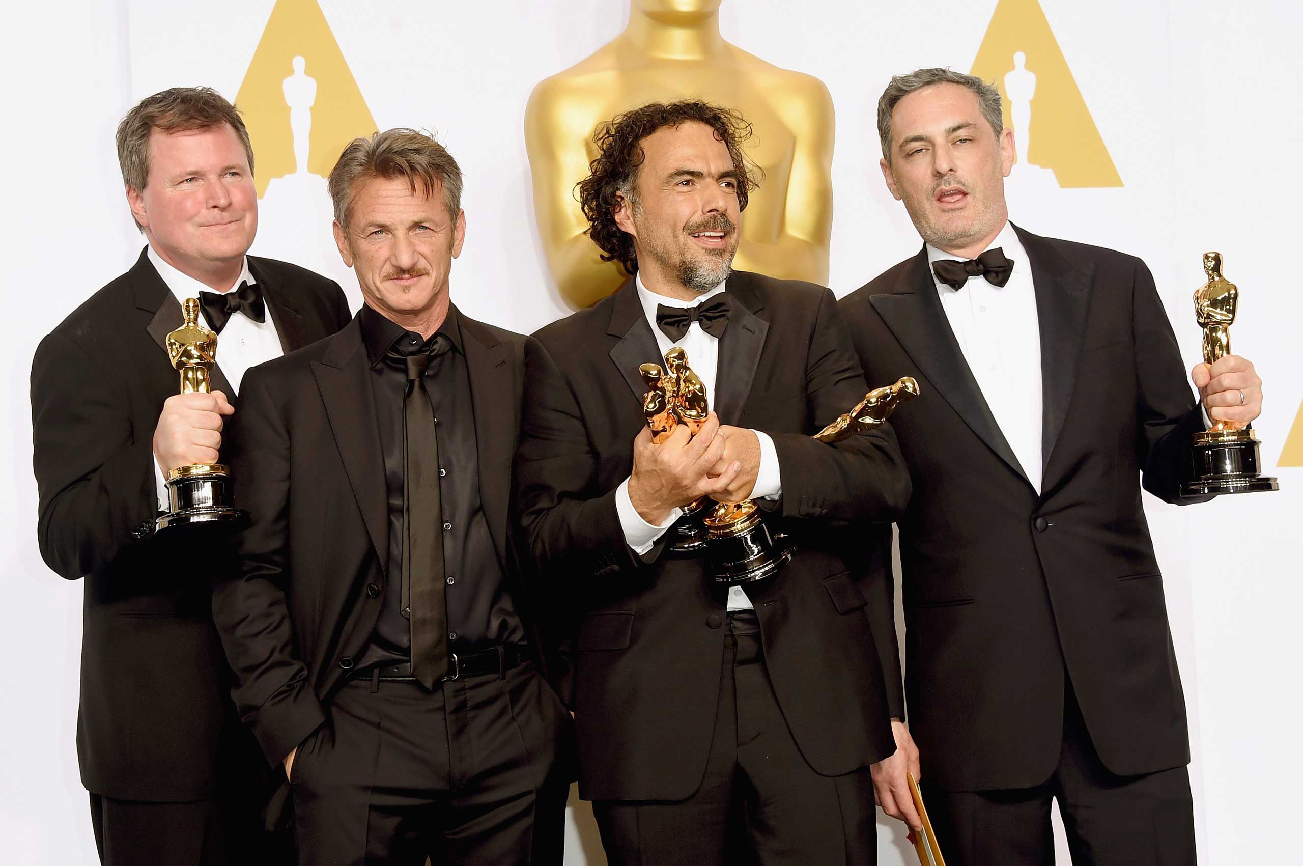 Producer James W. Skotchdopole, actor Sean Penn, director Alejandro G. Inarritu, winner of Best Original Screenplay, Best Director, and Best Motion Picture, for 'Birdman' and producer John Lesher pose in the press room during the 87th Annual Academy Awar