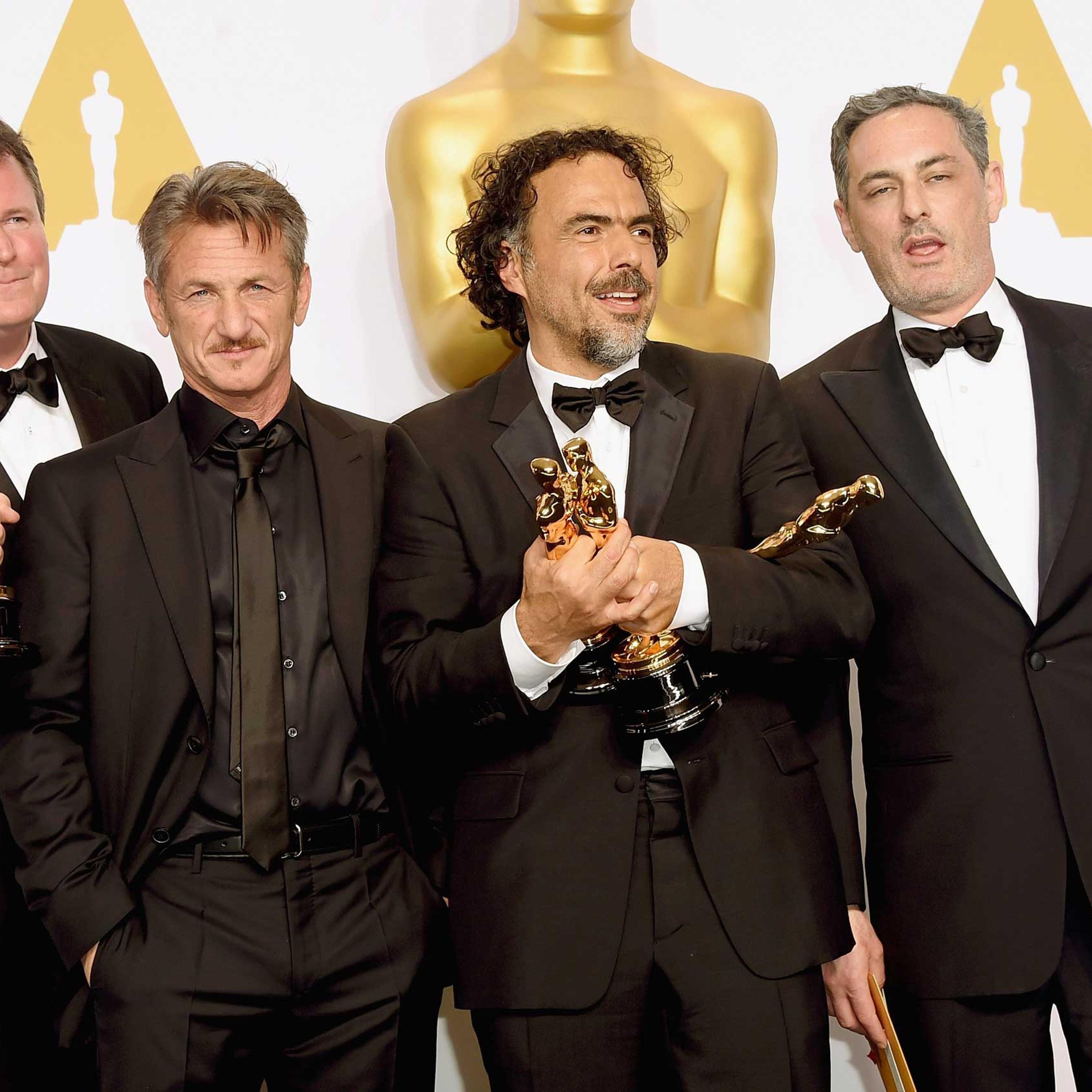 Producer James W. Skotchdopole, actor Sean Penn, director Alejandro G. Inarritu, winner of Best Original Screenplay, Best Director, and Best Motion Picture, for 'Birdman' and producer John Lesher pose in the press room during the 87th Annual Academy Awar