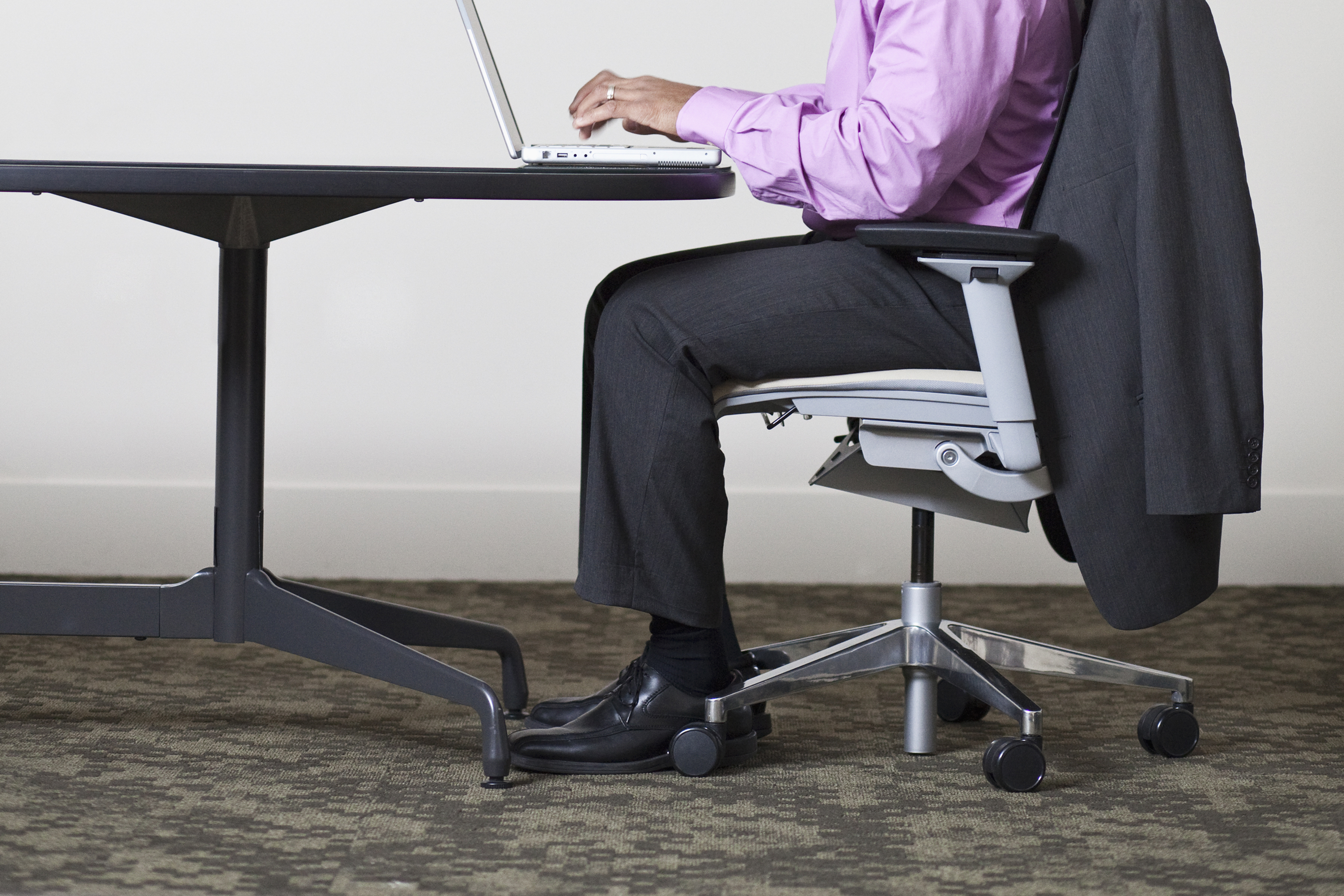 African American businessman using laptop