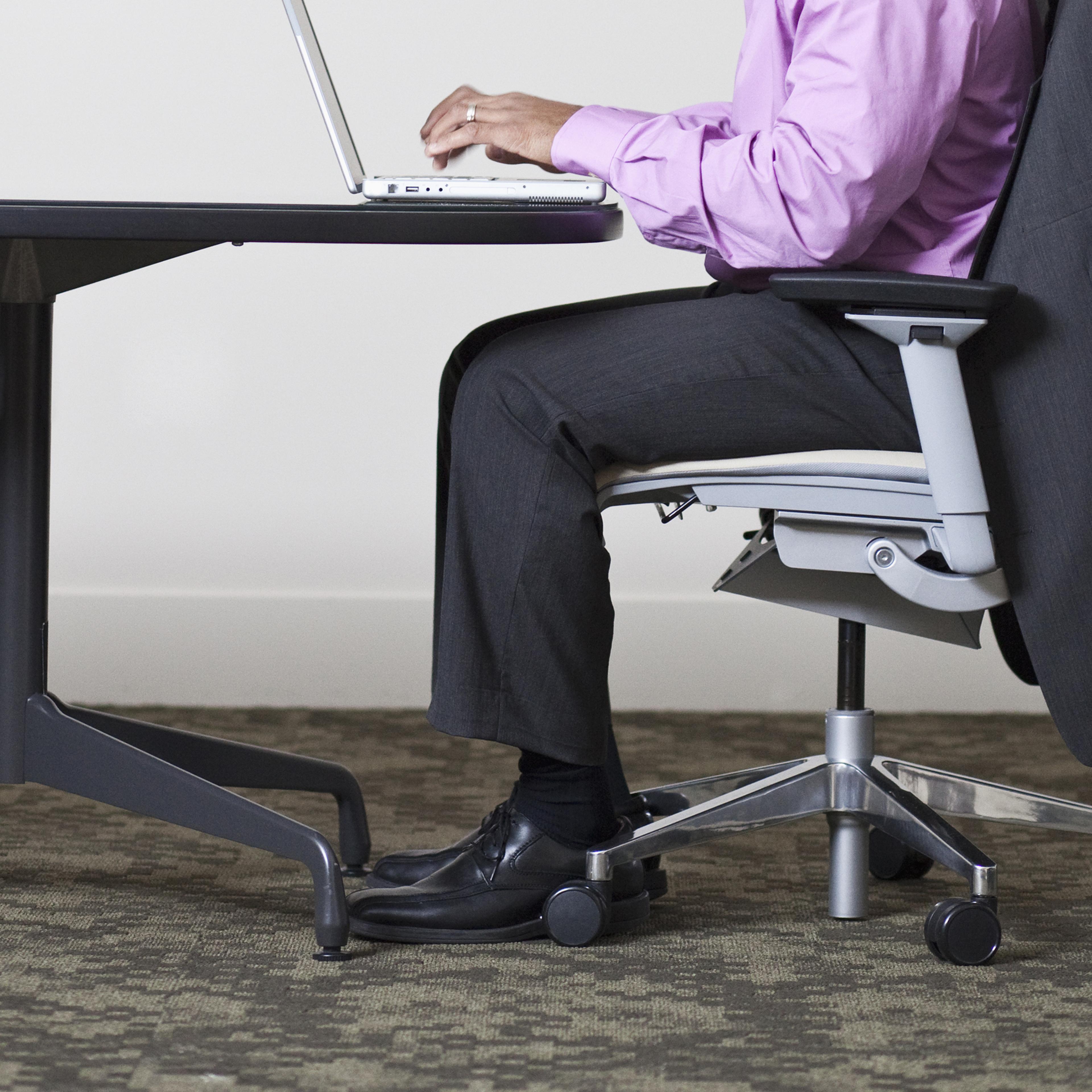 African American businessman using laptop