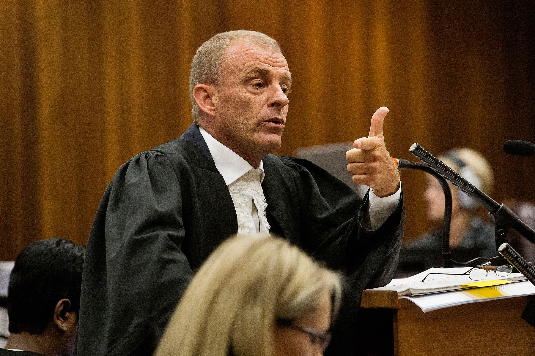 State prosecutor Gerrie Nel gestures as he cross examines Oscar Pistorius during his ongoing murder trial in Pretoria, April 10, 2014