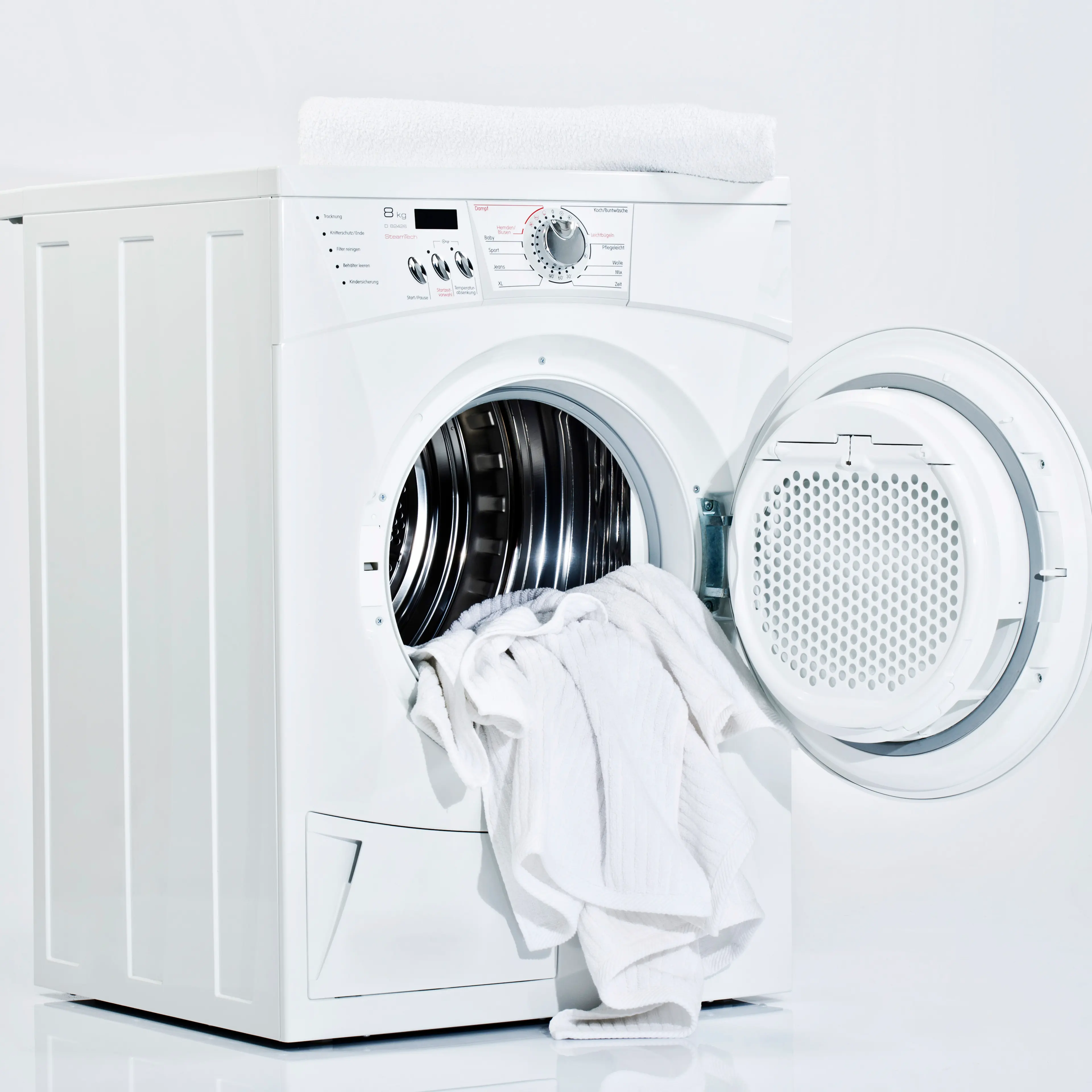 Washing machine on white background