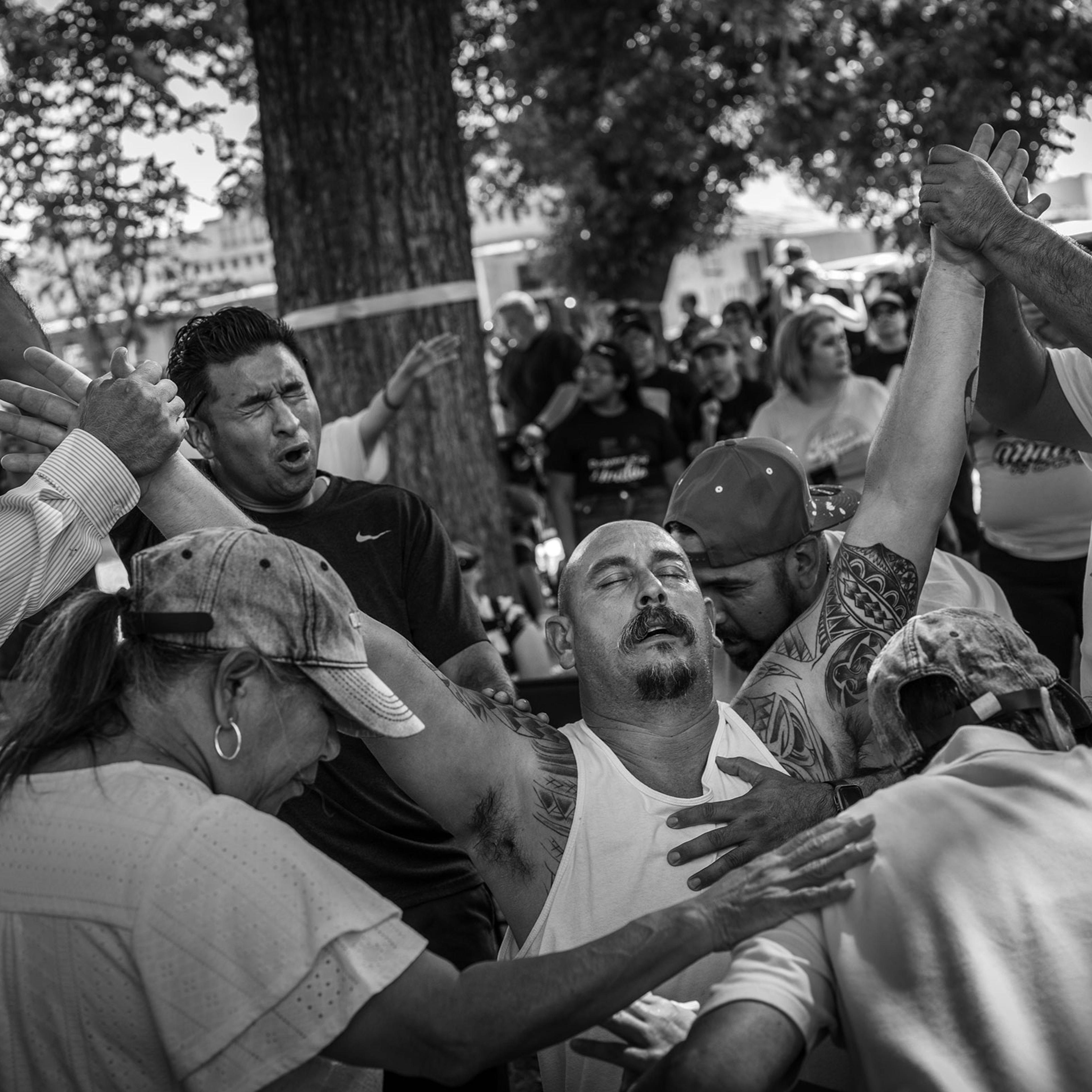 A group gathers to remember the shooting victims from Robb Elementary in Uvalde, May 27, 2022.