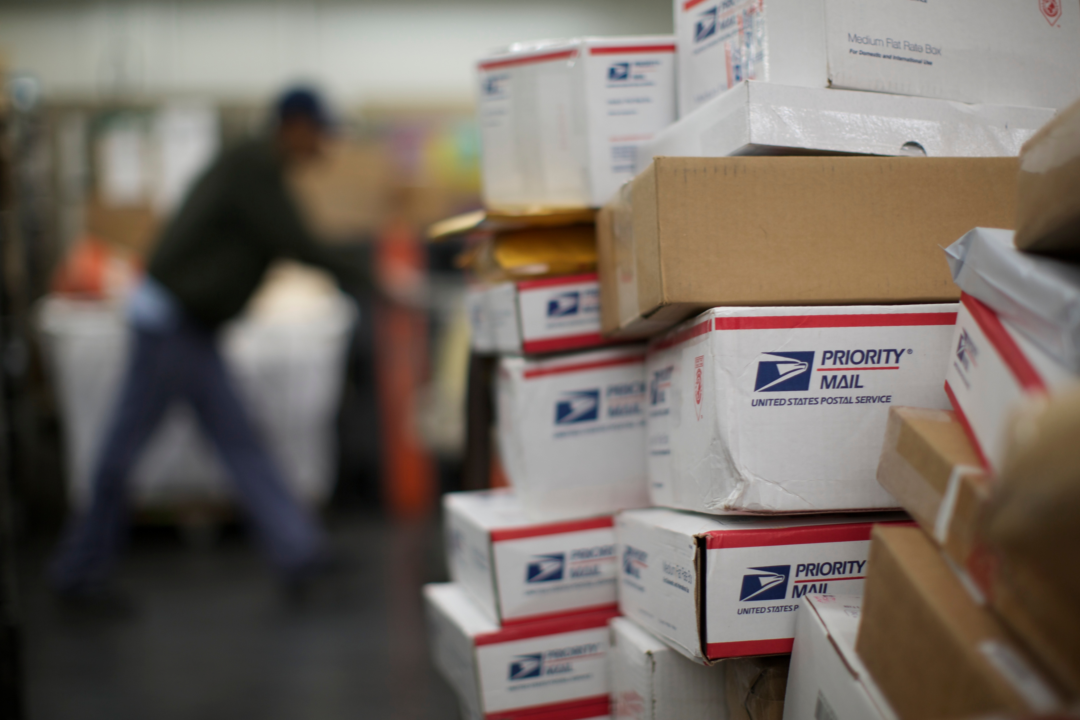 United States Postal Service clerks sort mail at the USPS Lincoln Park carriers annex in Chicago