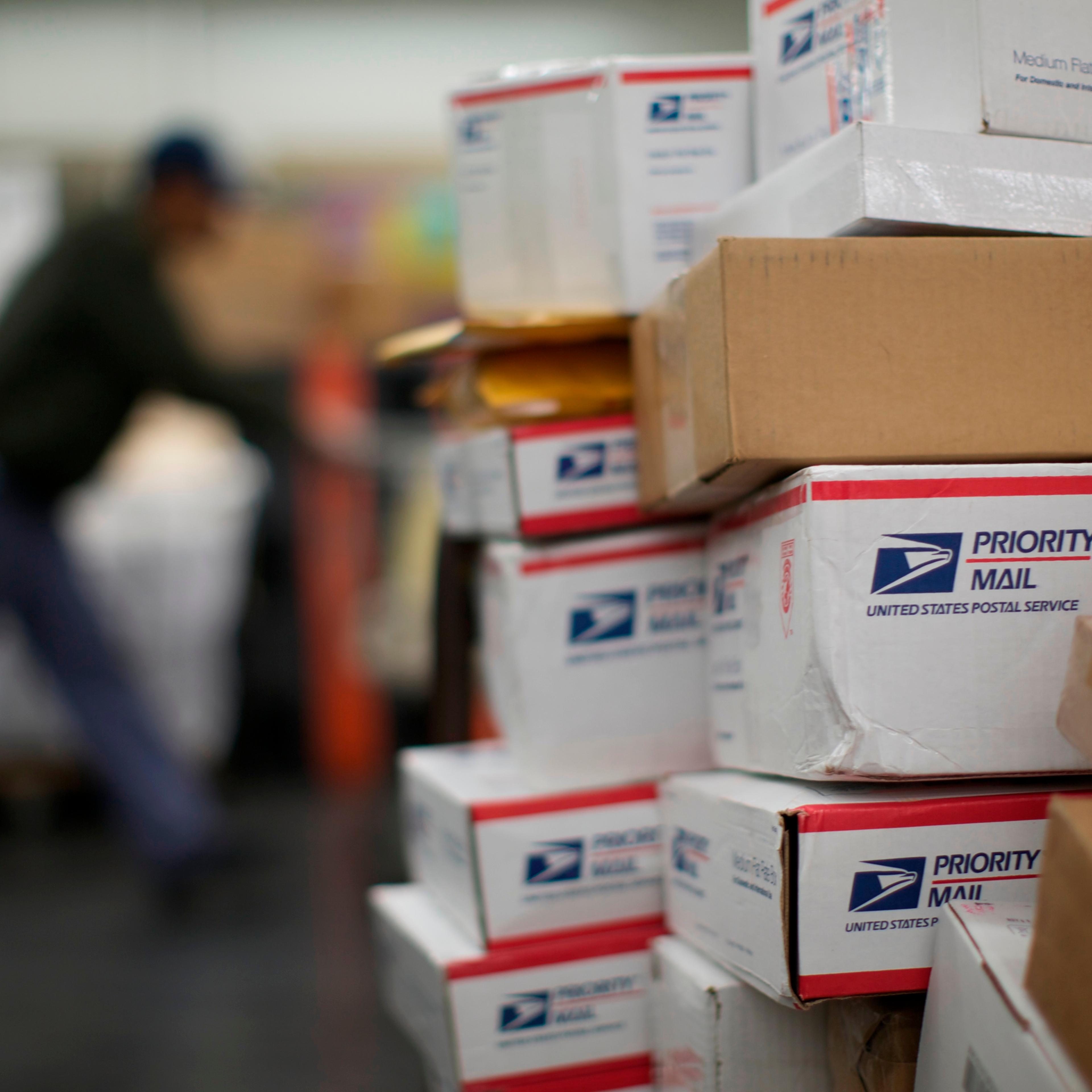 United States Postal Service clerks sort mail at the USPS Lincoln Park carriers annex in Chicago