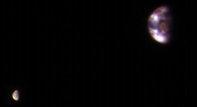 The Earth and the moon, as seen from Mars, via a composite image from four sets of images from the High Resolution Imaging Science Experiment (HiRISE) camera on NASA’s Mars Reconnaissance Orbiter, captured on Nov. 20, 2016. Each image was processed separately prior to combining to ensure the moon is visible, and retains the correct sizes and positions of both relative to each other.