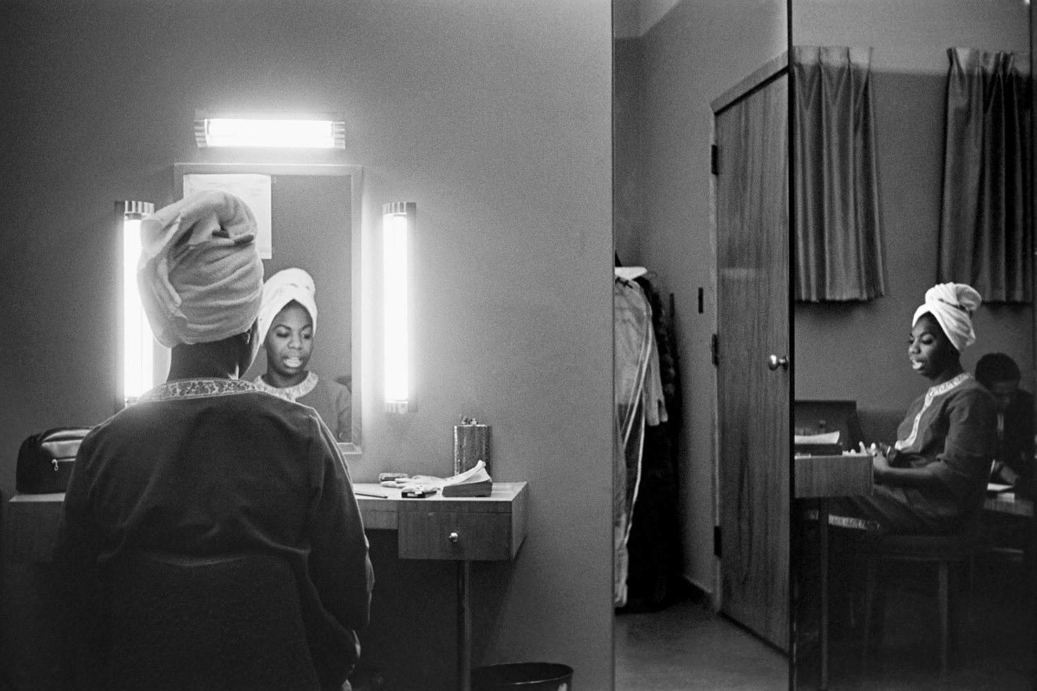 Nina Simone getting ready in a motel room in Buffalo, New York. December 1964.