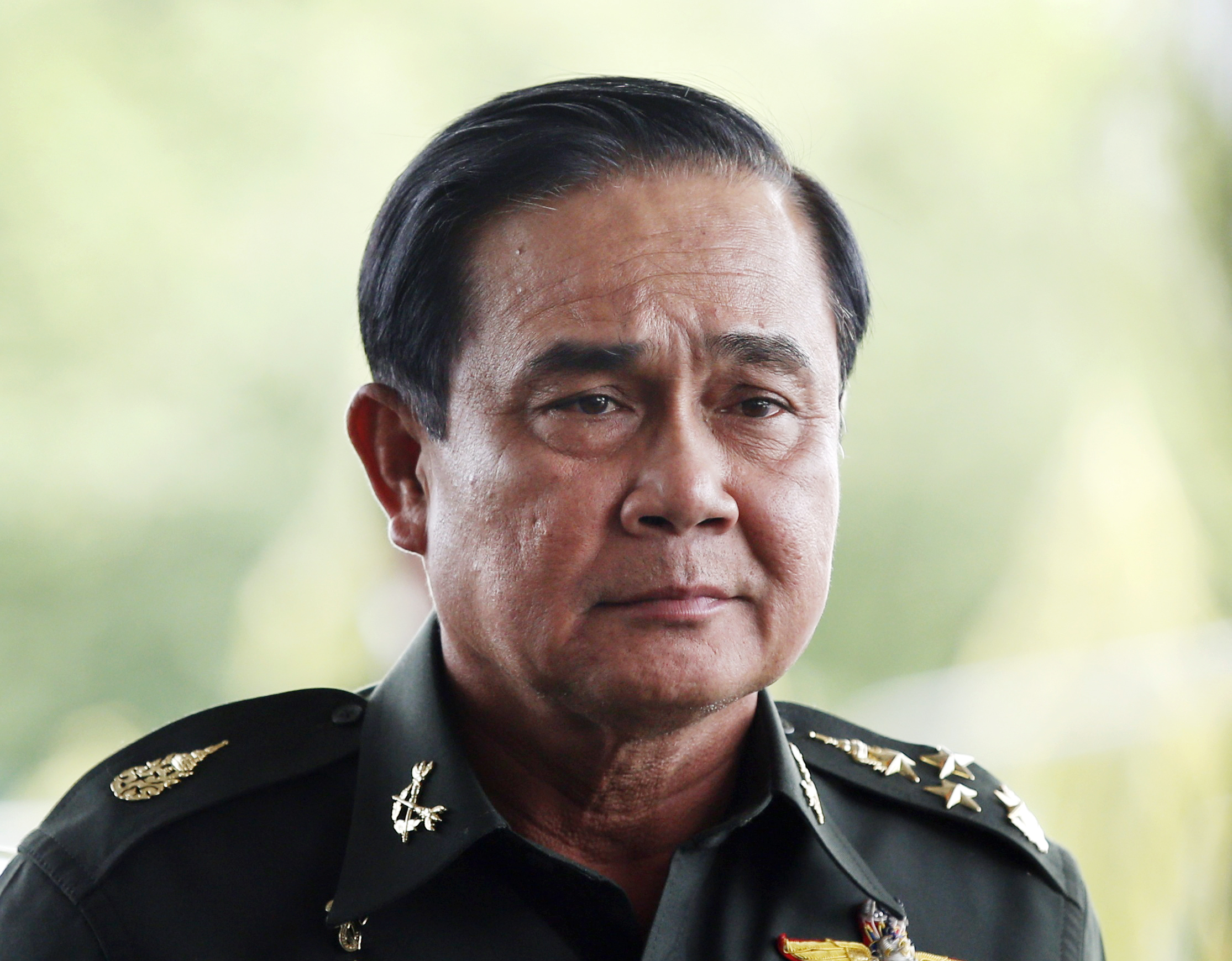 Thai Army chief General Prayuth Chan-ocha arrives to give a news conference at the Army Club in Bangkok