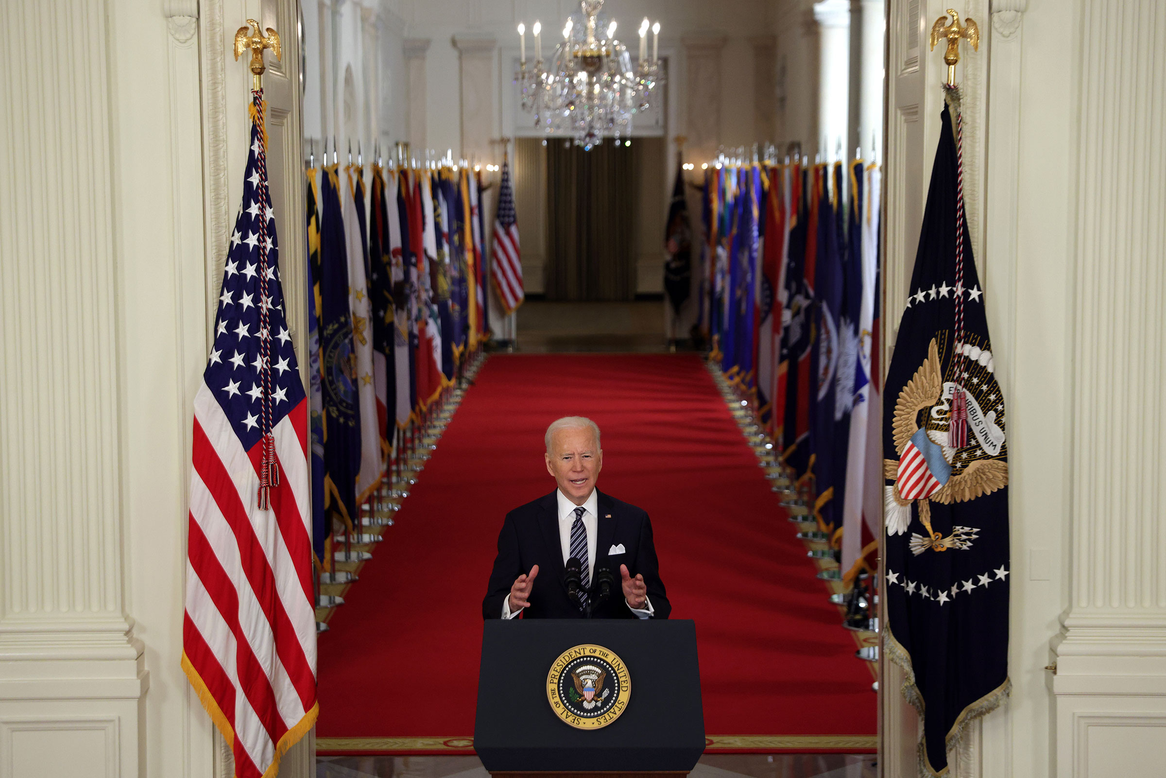 President Joe Biden speaks as he gives a primetime address to the nation from the East Room of the White House in Washington, on March 11, 2021.