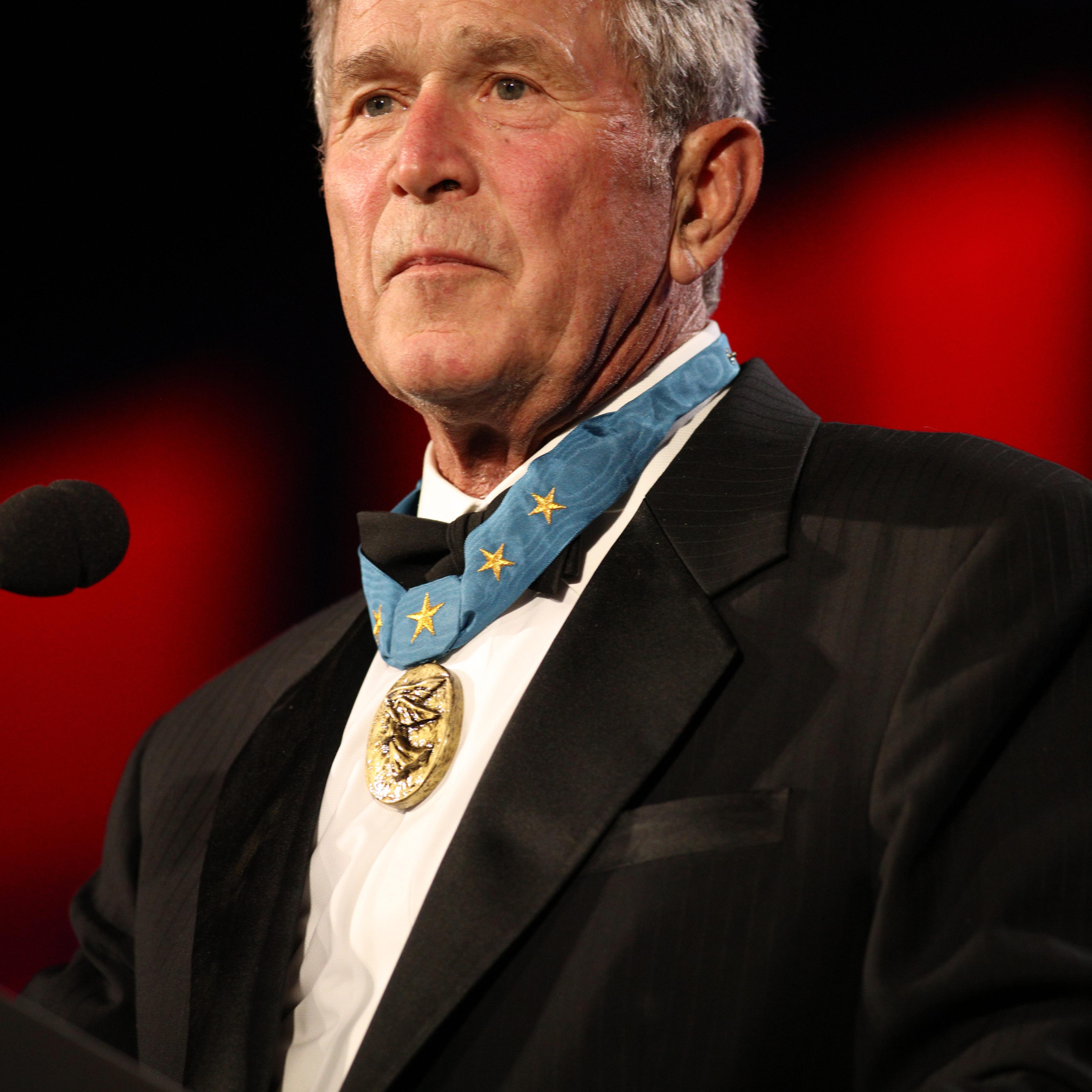 George W. Bush takes the stage at the 2015 Starkey Hearing Foundation So The World May Hear Gala in St. Paul, Minn., at the St. Paul RiverCentre on July 26, 2015.