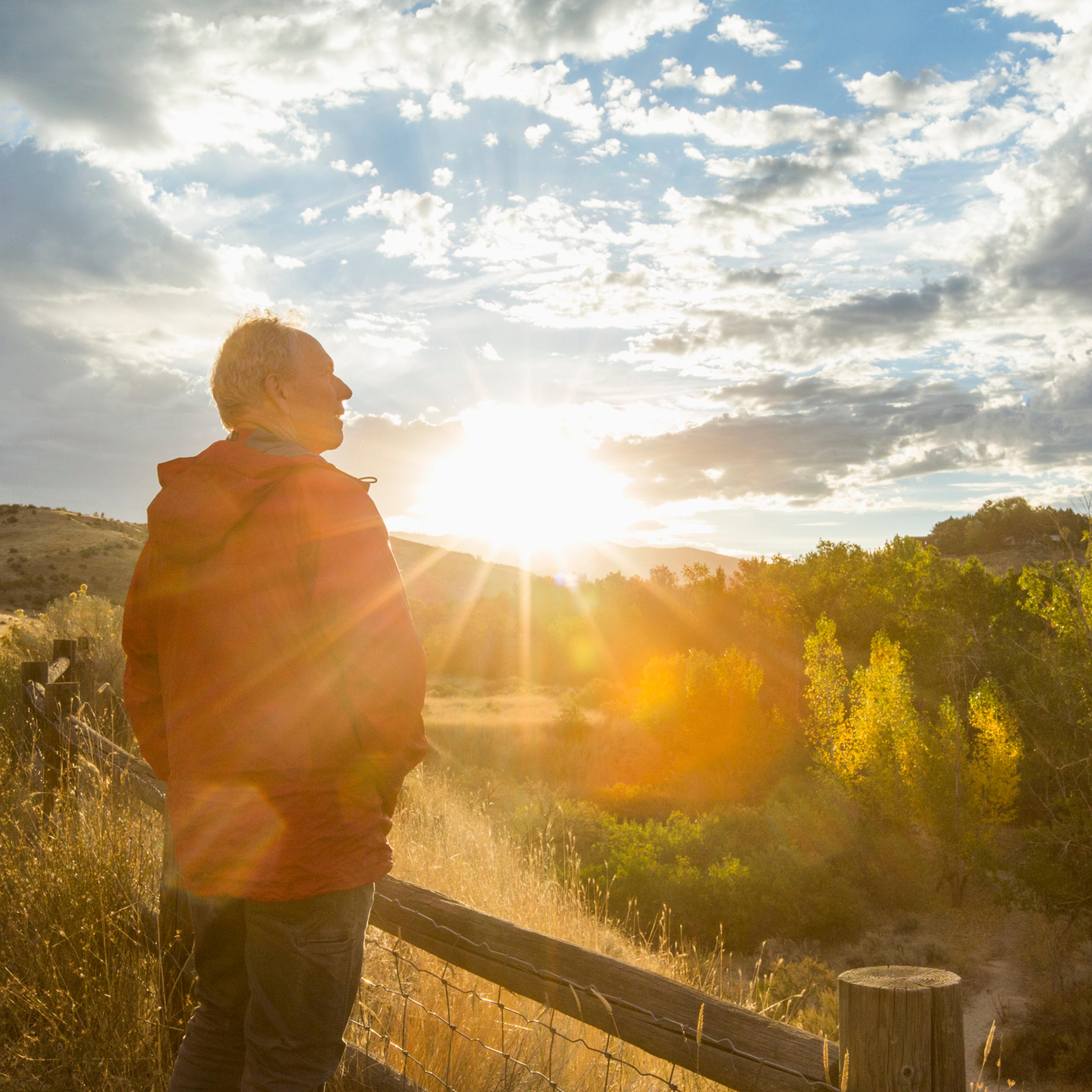 Caucasian man admiring sunset