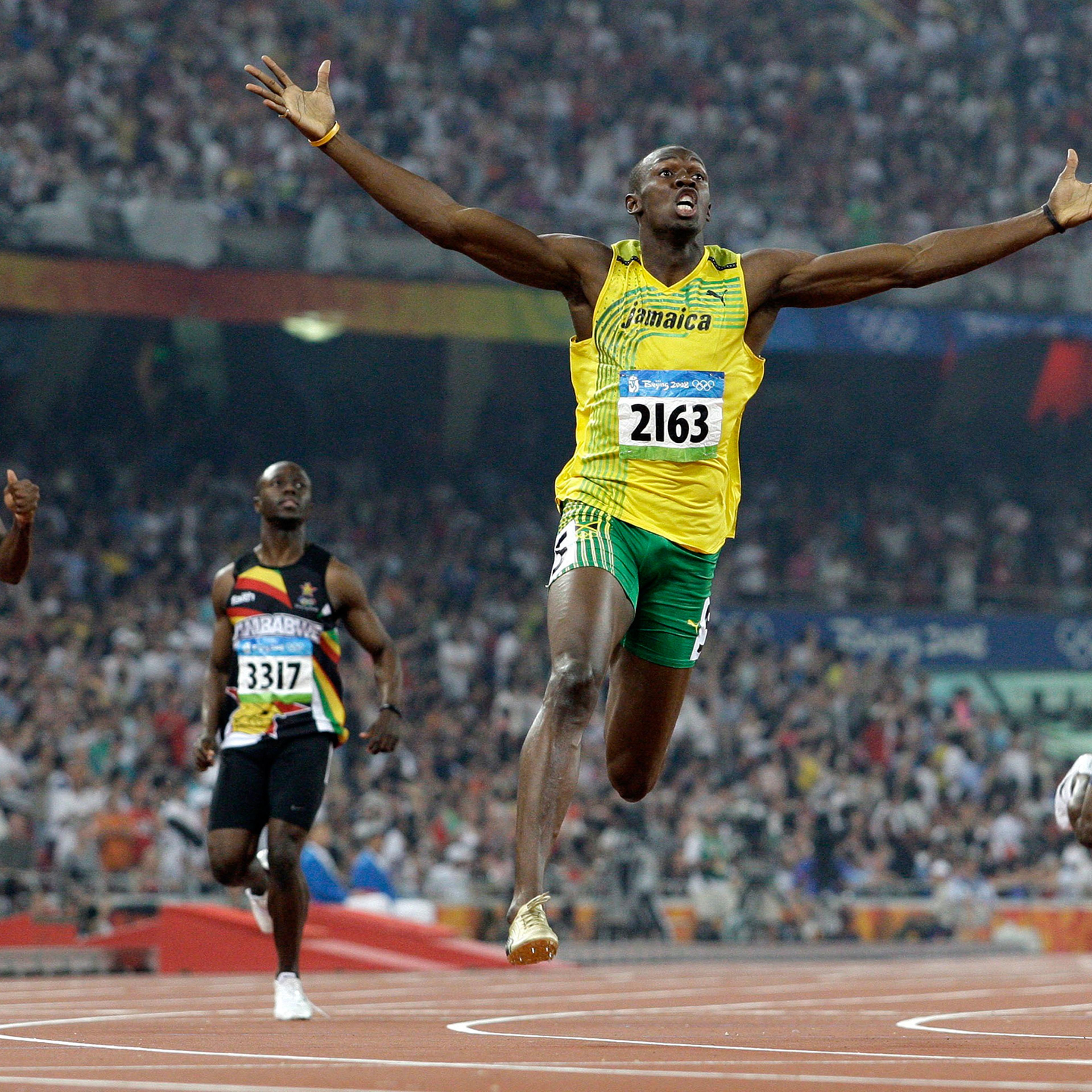 Jamaica's Usain Bolt crosses the finish line to win the gold in the men's 200-meter final during the athletics competitions in the National Stadium at the Beijing 2008 Olympics, Aug. 20, 2008.