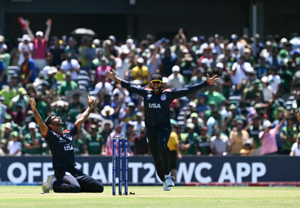 USA's Saurabh Nethralvakar (L) celebrates winning during the ICC men's Twenty20 World Cup 2024 group A cricket match between the USA and Pakistan at the Grand Prairie Cricket Stadium in Grand Prairie, Texas, on June 6, 2024.
