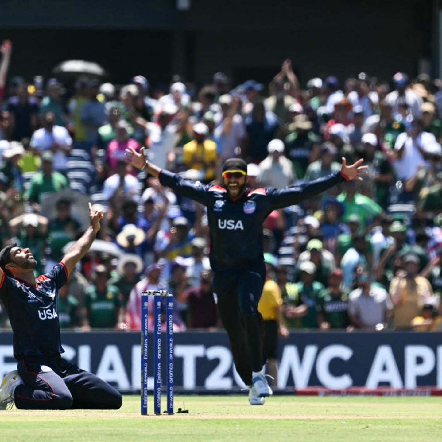 USA's Saurabh Nethralvakar (L) celebrates winning during the ICC men's Twenty20 World Cup 2024 group A cricket match between the USA and Pakistan at the Grand Prairie Cricket Stadium in Grand Prairie, Texas, on June 6, 2024.