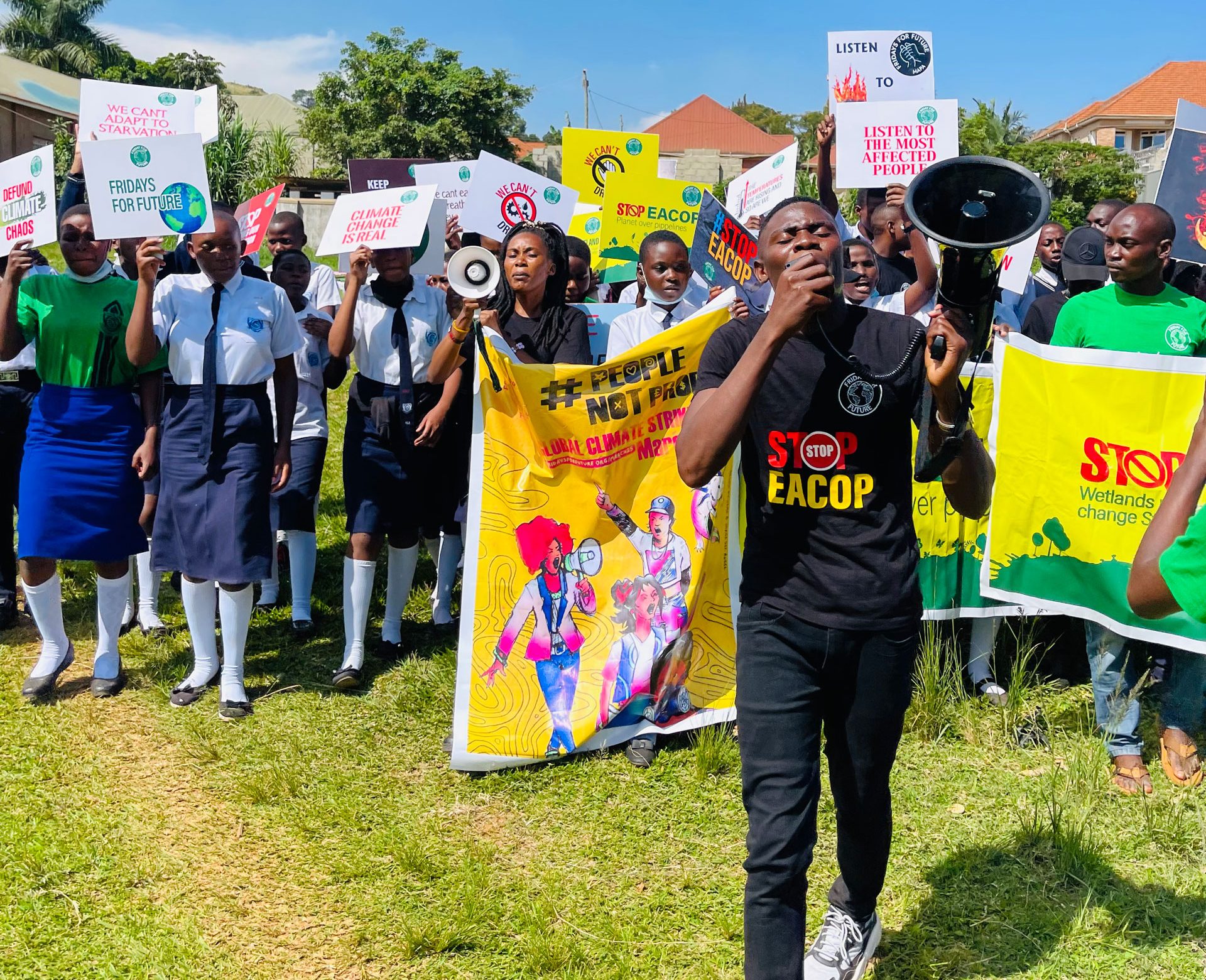 Nyombi Morris leads a protest against the 'East African Crude Oil Pipeline' project on March 25, 2022 at Mutundwe Young Christian Secondary School in Kirinyabigo, Kampala Uganda.