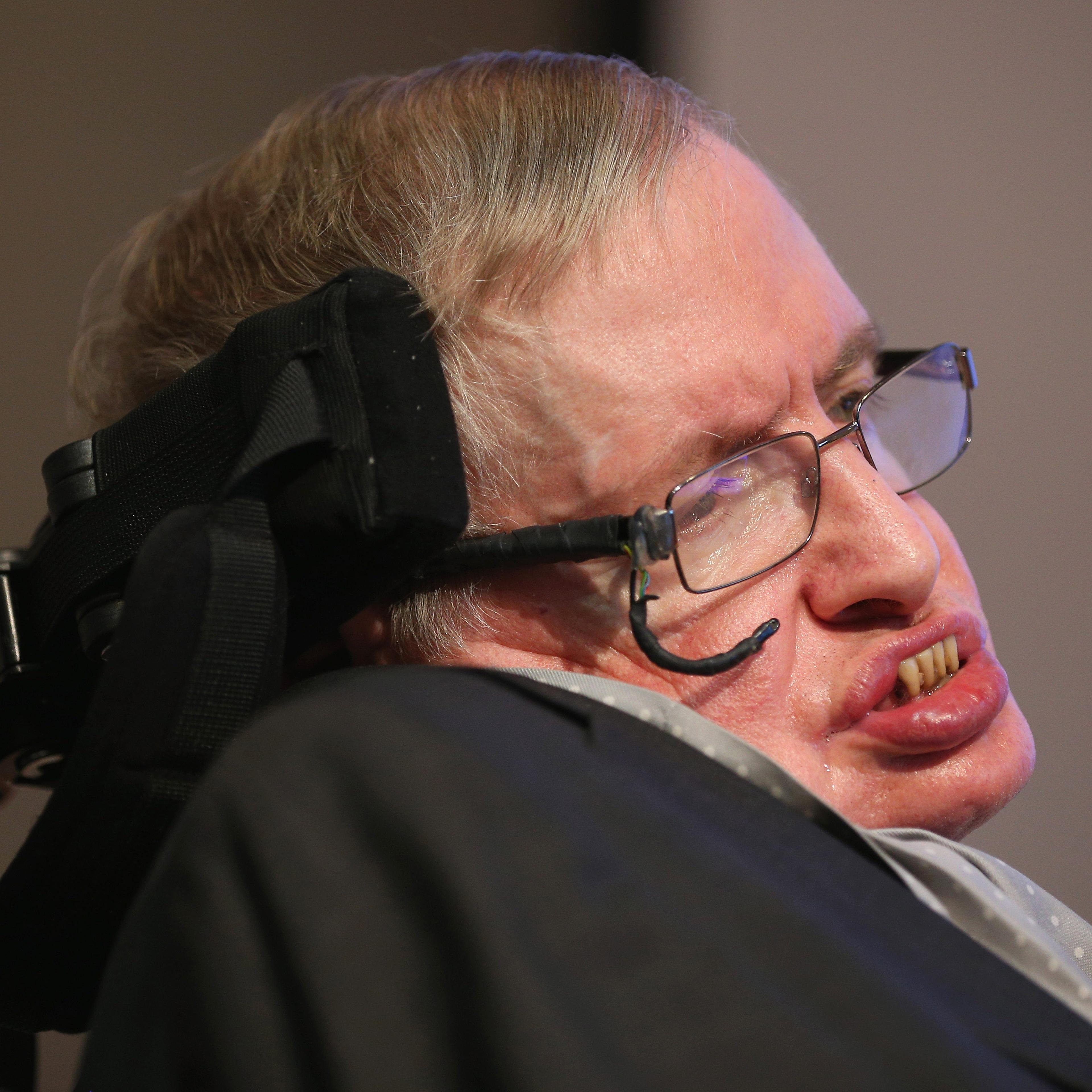 Theoretical Physicist Professor Stephen Hawking sits on stage on December 16, 2015 in London, England.