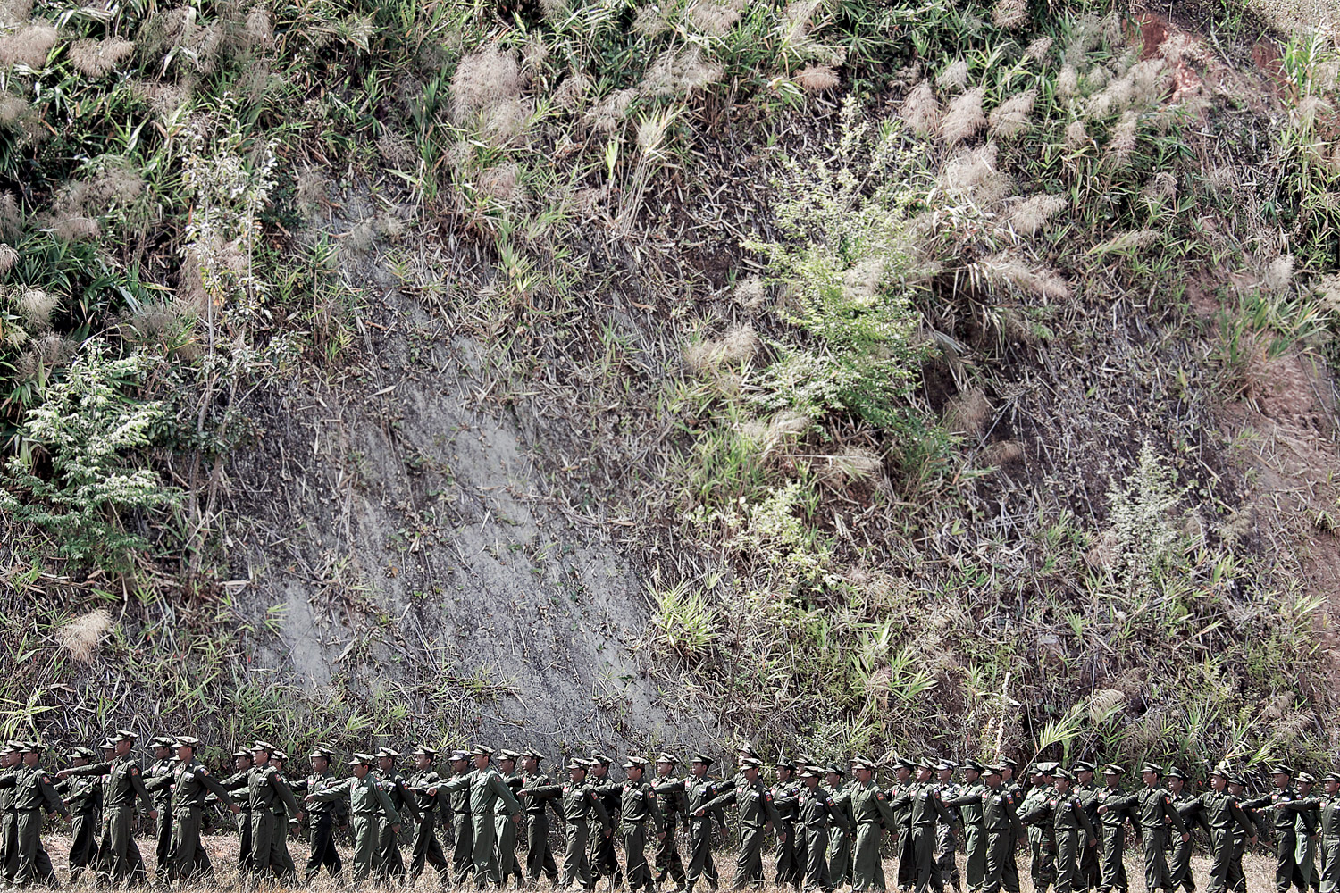 KIA officers perform a military training at the School of Officers, situated in a secret location in the high mountains some kilometers away from Laiza city, the headquarters of the rebel Kachin Independence Army. 