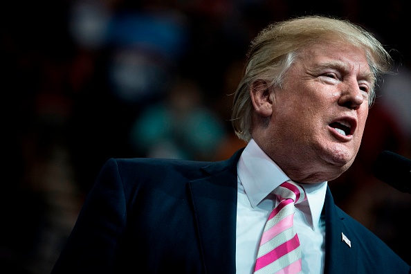 US President Donald Trump addresses a rally for Sen. Luther Strange (R-AL) at the Von Braun Civic Center September 22, 2017 in Huntsville, Alabama.