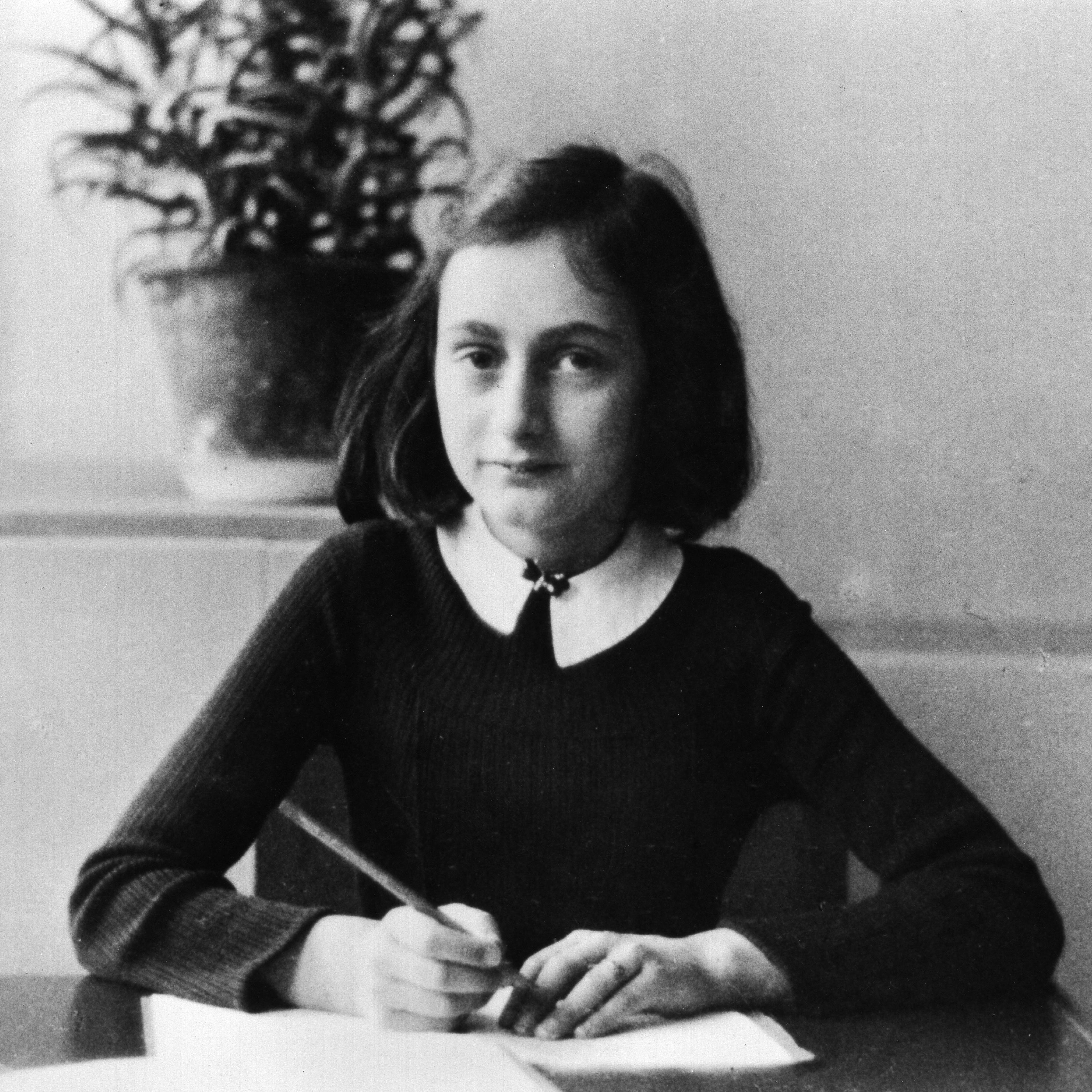 Anne Frank, German Jew who emigrated with her family to the Netherlands during the Nazi era. Separated from the rest of her family, she and her sister died of typhoid fever in the concentration camp Bergen-Belsen - As a 12-year old doing her homewo