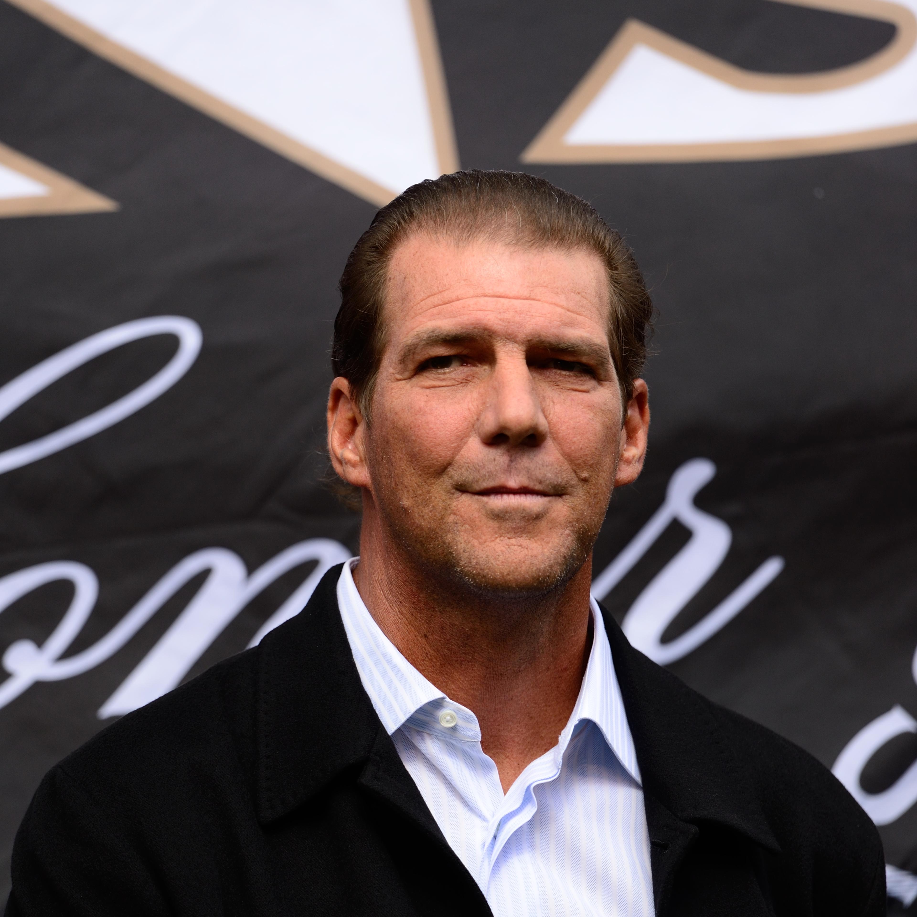 Baltimore Ravens owner Steve Bisciotti on the field during a week three game between the Houston Texans and the Baltimore Ravens on Sept. 22, 2013, at M & T Bank Stadium in Baltimore.