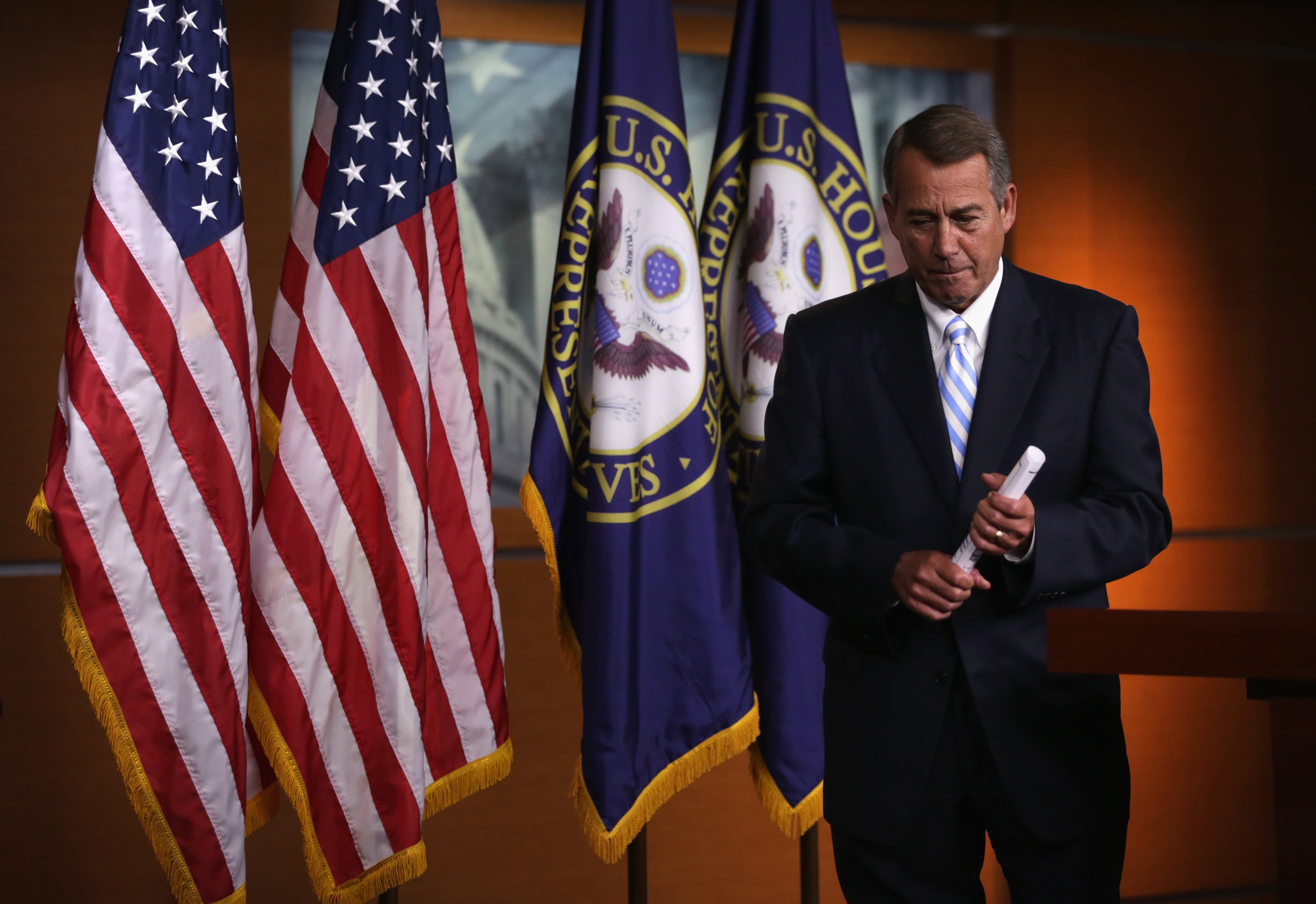 U.S. Speaker of the House Rep. John Boehner leaves after a press briefing July 31, 2014 on Capitol Hill in Washington.