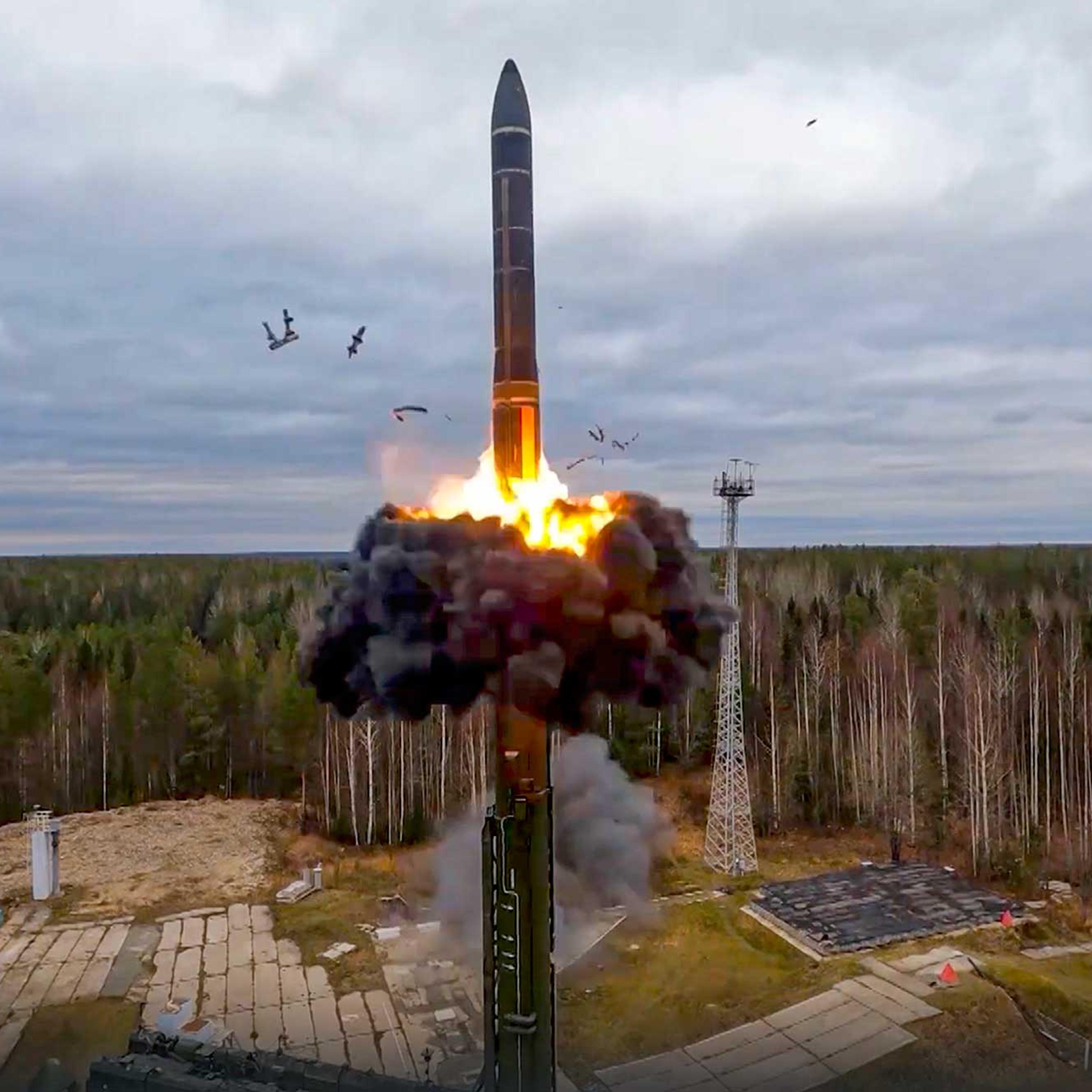 An intercontinental ballistic missile is fired from a launch site in northwest Russia as part of nuclear drills on Oct. 26, 2022.