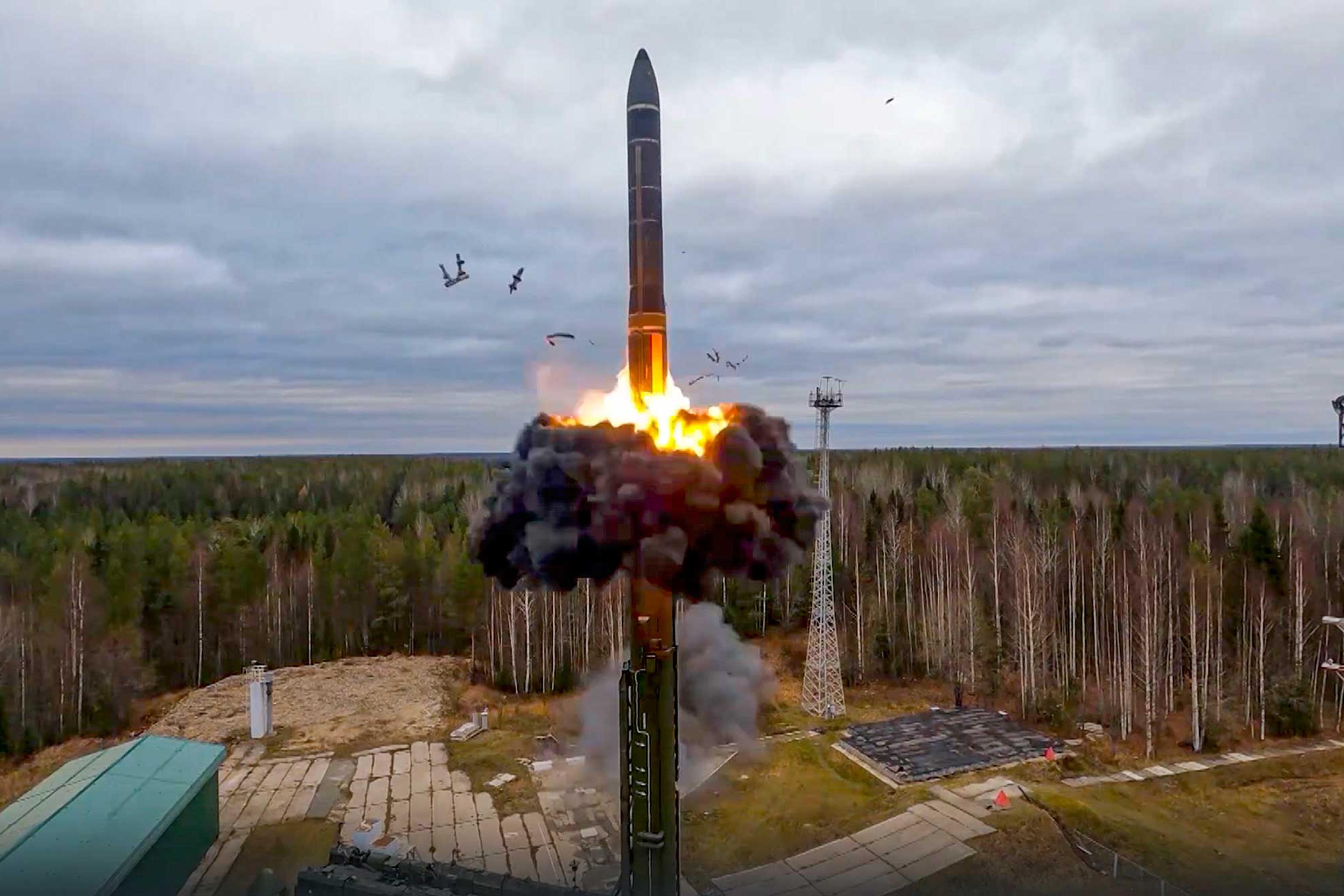 An intercontinental ballistic missile is fired from a launch site in northwest Russia as part of nuclear drills on Oct. 26, 2022.