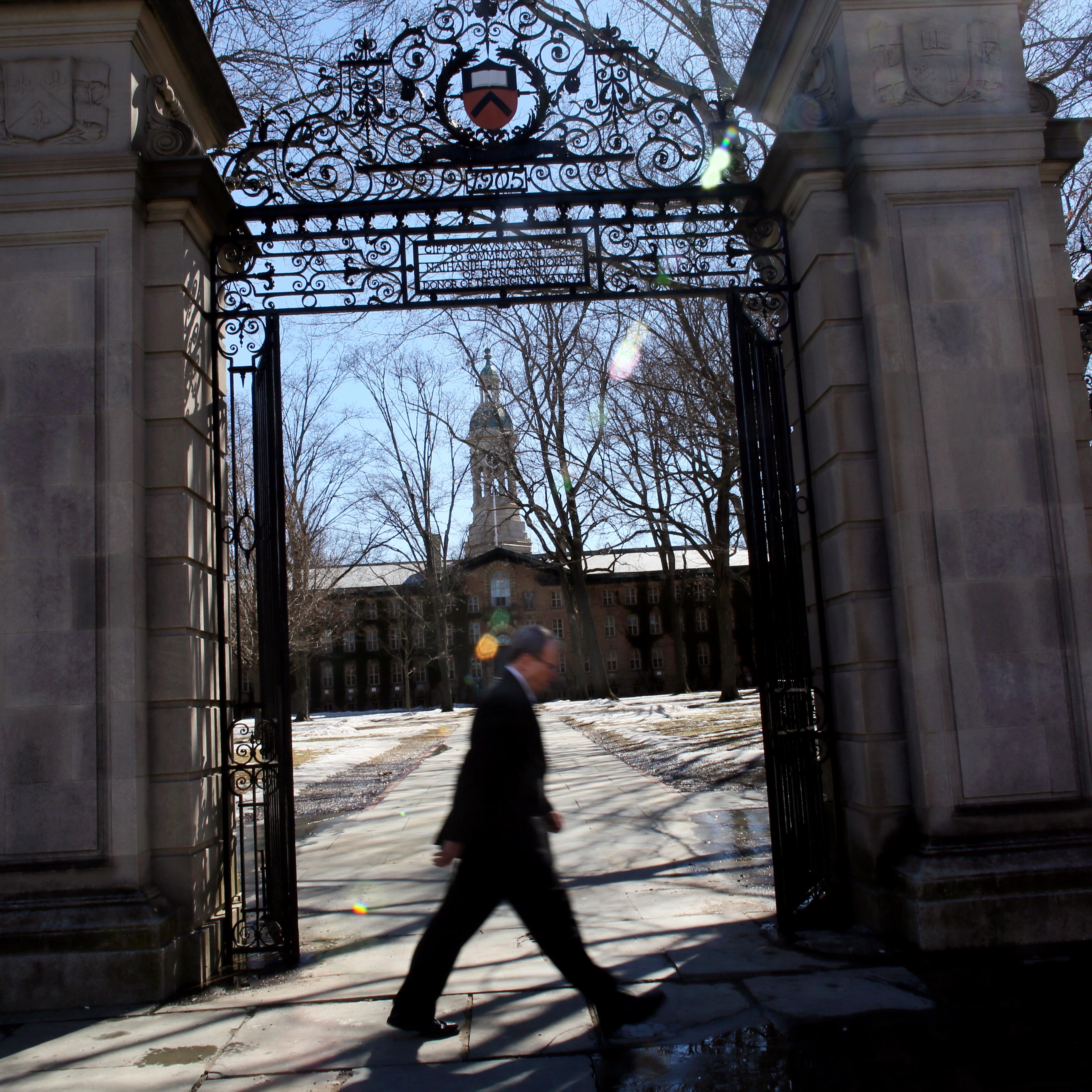 PRINCETON, NJ - MARCH 12: Walking along Nassau St., in front of
