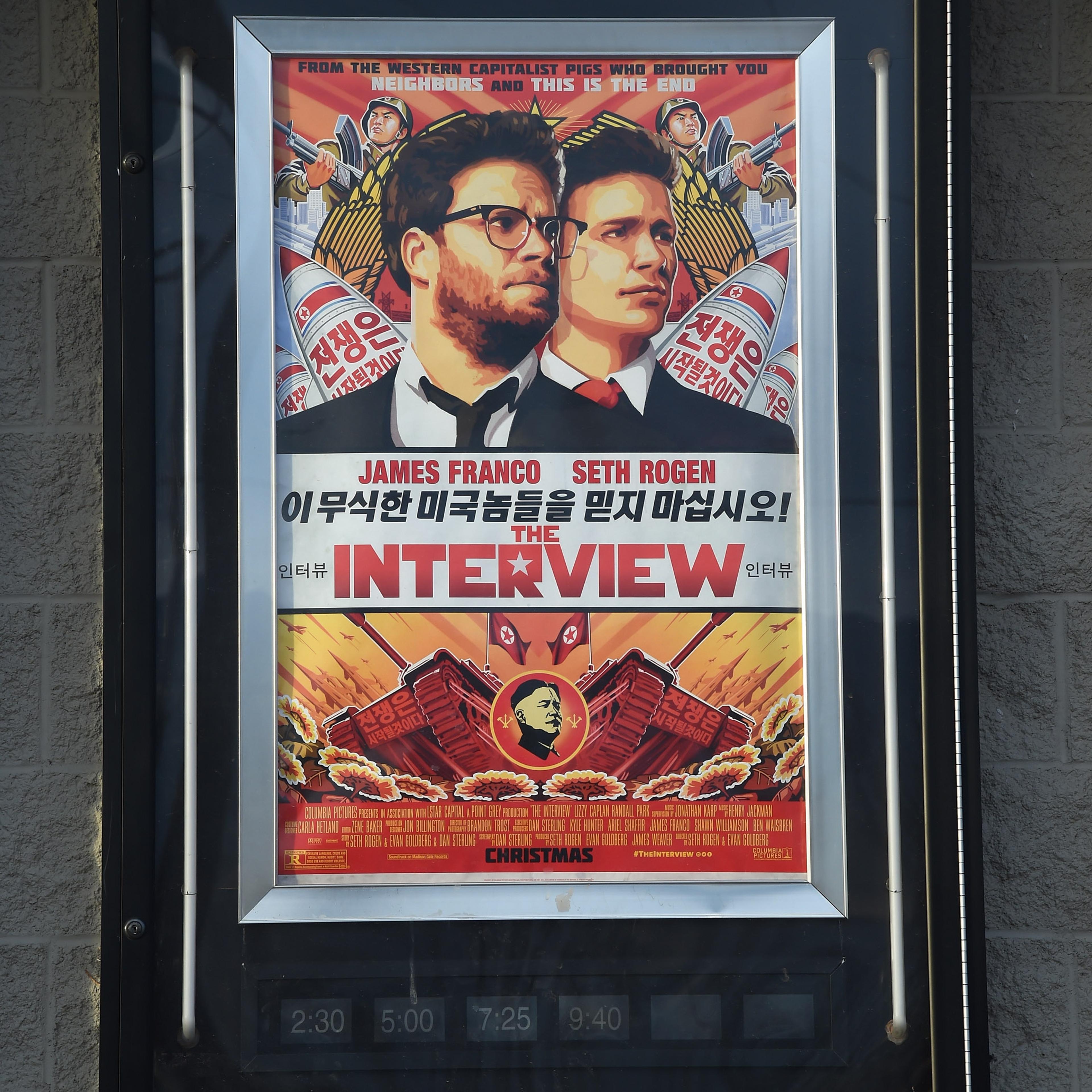 A movie poster for "The Interview" is displayed outside the Megaplex Theatres - Stadium 6 on Dec. 25, 2014 in Mesquite, Nev.
