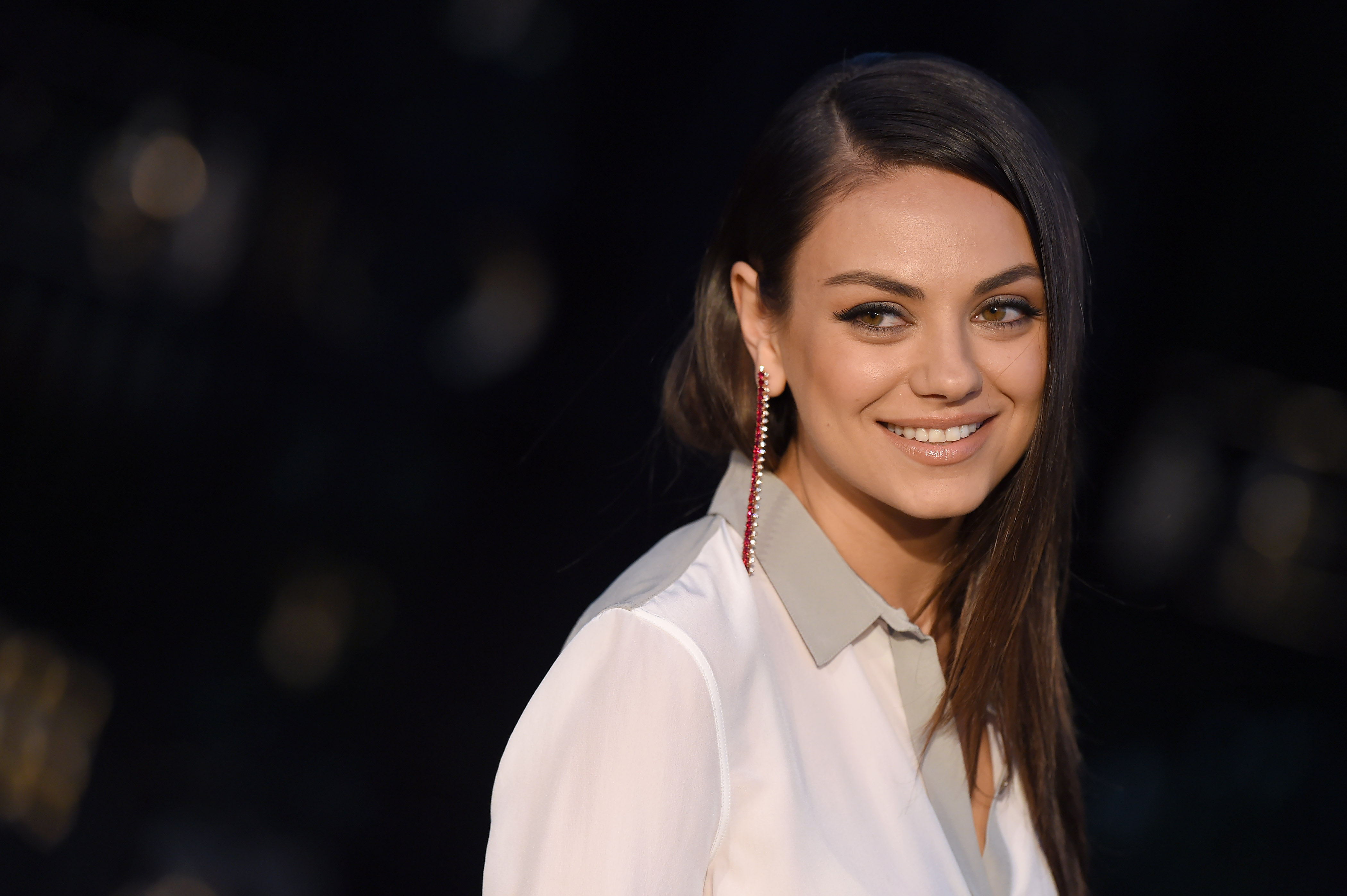 Actress Mila Kunis attends the Burberry 'London in Los Angeles' event at Griffith Observatory on April 16, 2015 in Los Angeles, California.