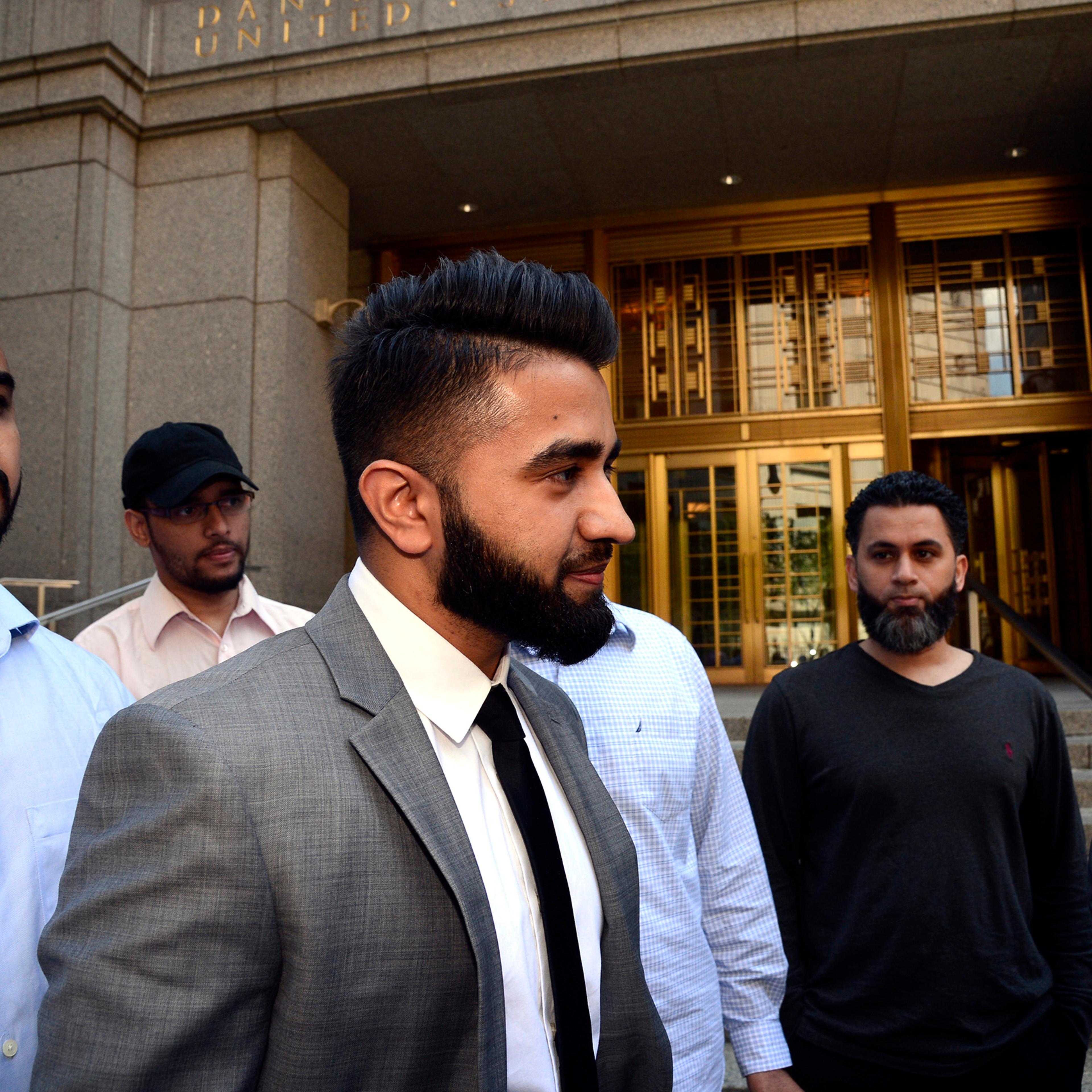 New York Police Department officer Masood Syed, center, leaves Manhattan Federal Court on June 22, 2016. Sayed, a Sunni Muslim, filed a lawsuit against the city for suspending him from the force over the length of his beard.