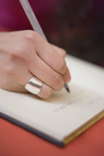 woman-writing-notebook
