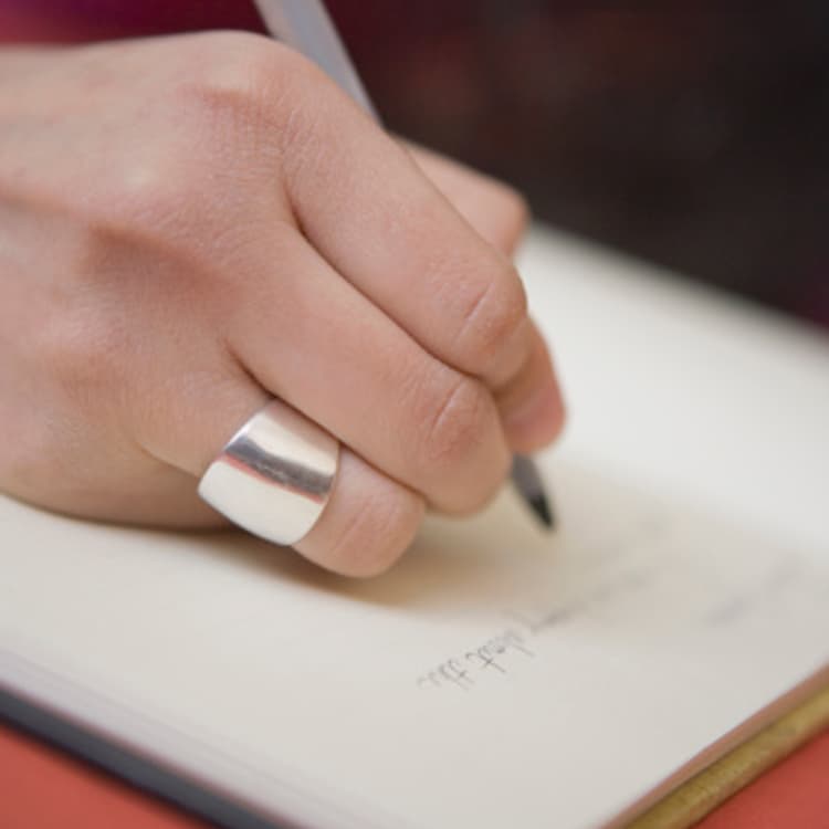 woman-writing-notebook